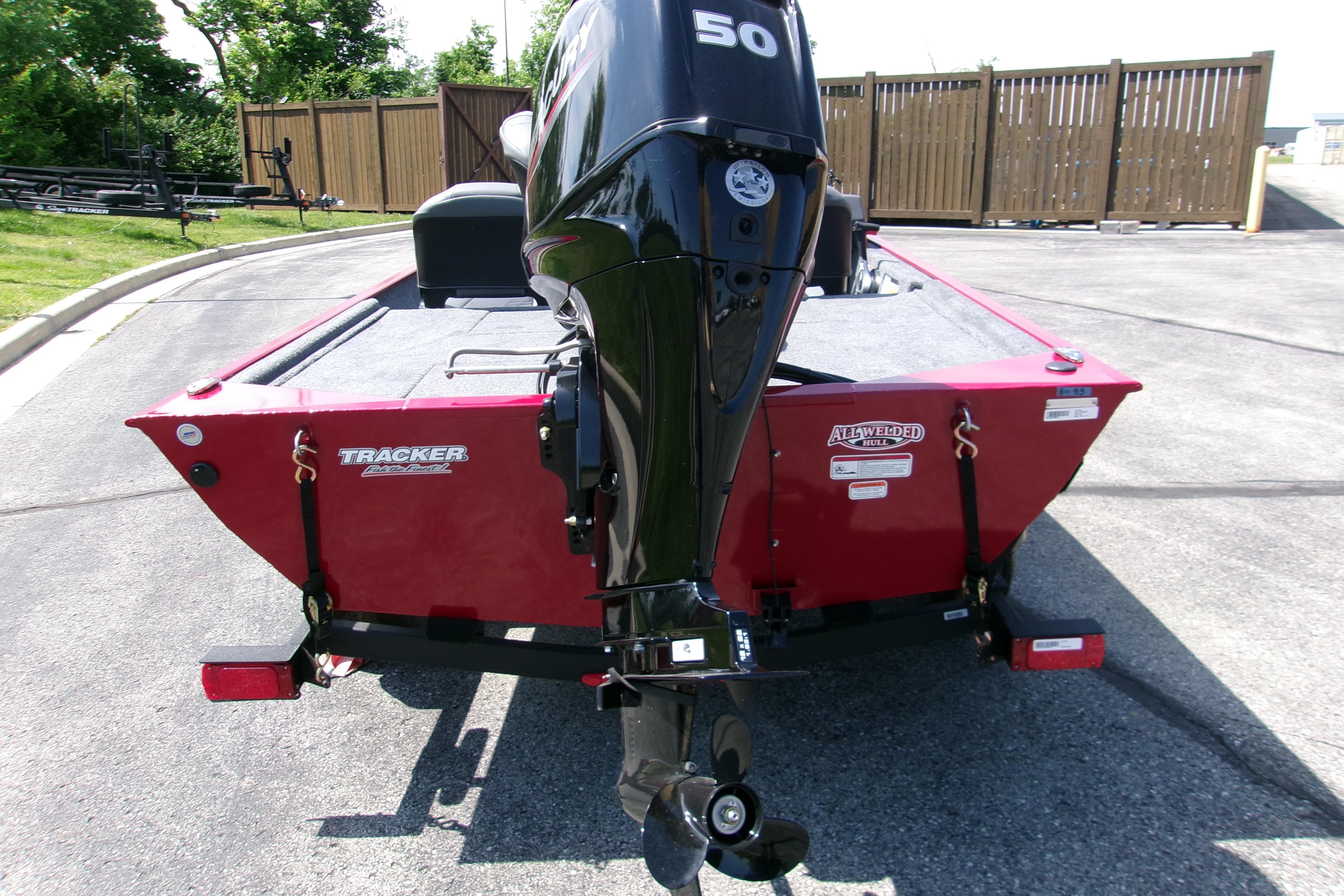 2026 Tracker Bass Tracker Classic XL boat with 50 HP outboard motor, rear view.