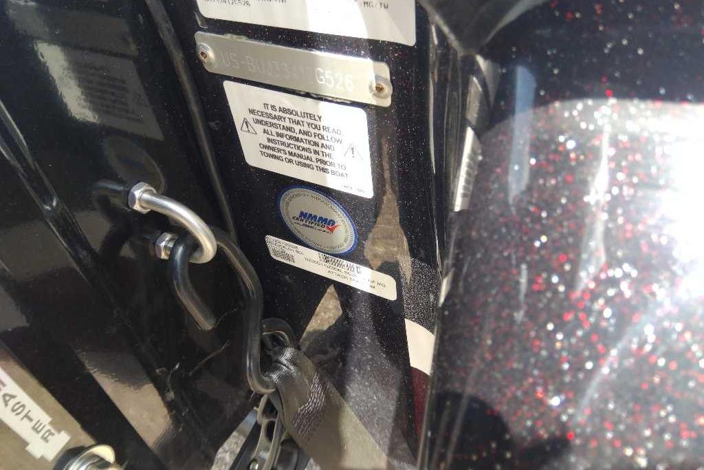 Close-up of Nitro Z20 XL Pro 2026 boat identification and safety labels.
