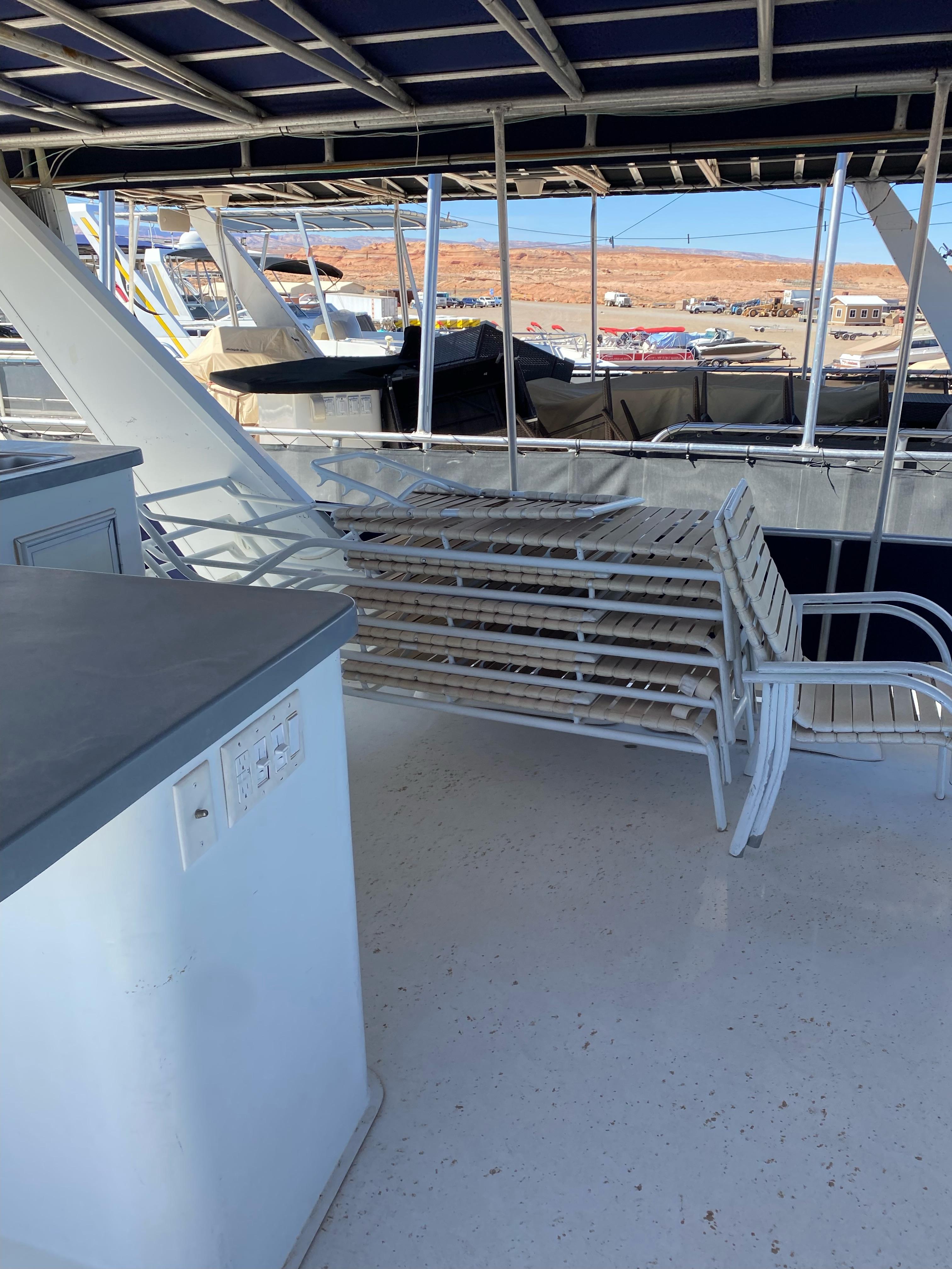 2001 Stardust Cruisers Summer Dreamin' Trip 37 and 38 boat interior with seating and railing.