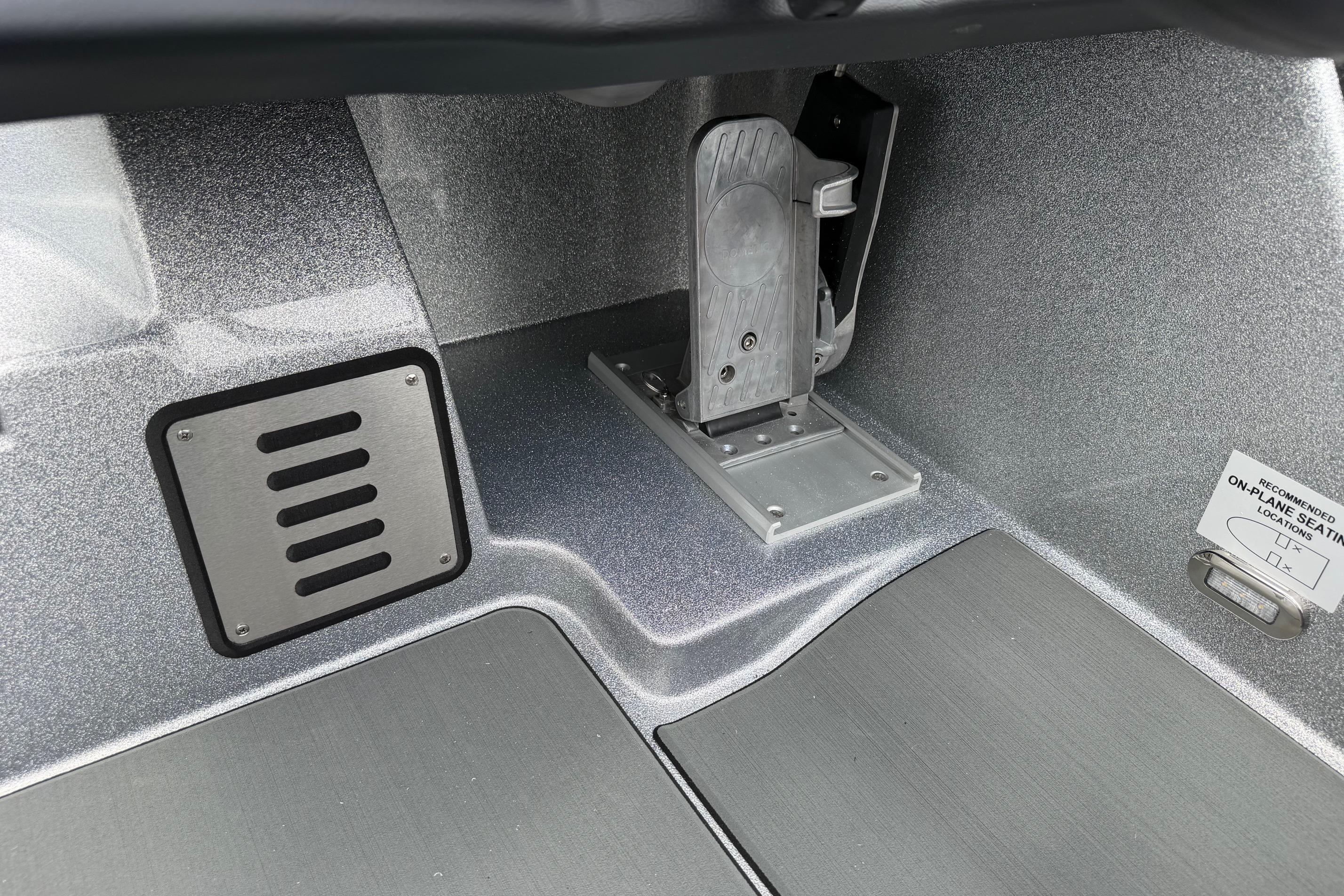Interior detail of 2027 Falcon F20 PREDATOR, showcasing sleek metallic design and foot pedal.