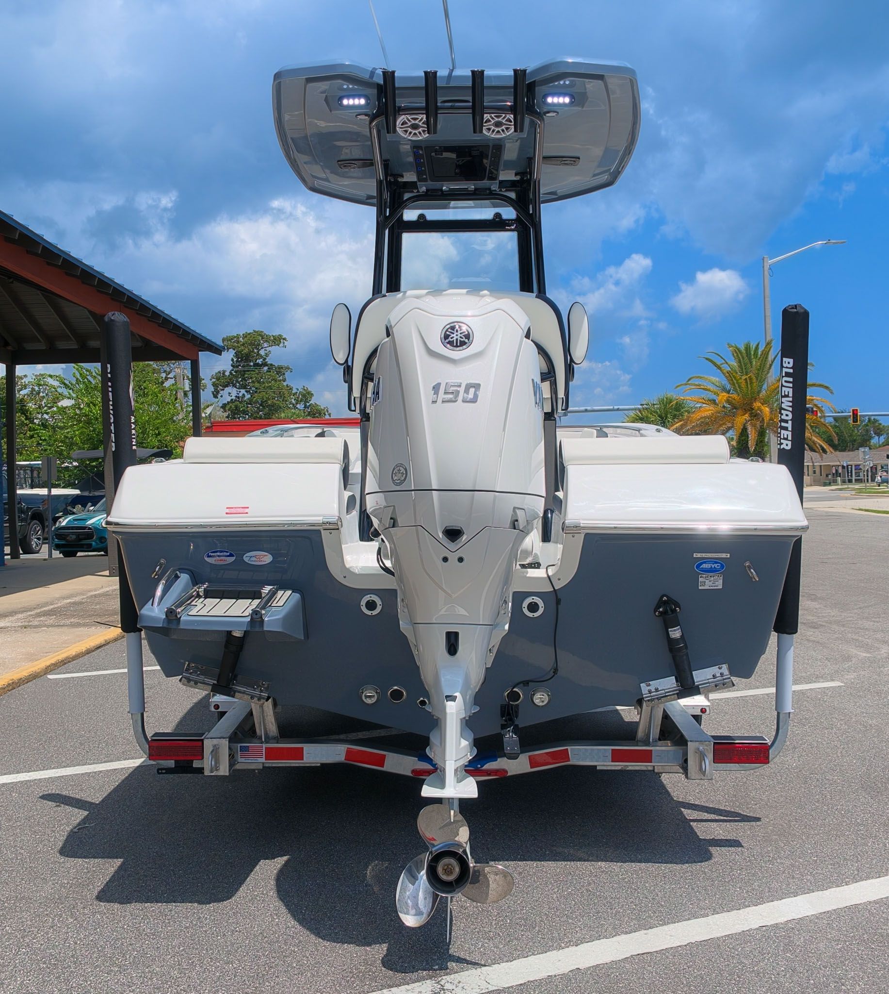 The image shows the stern of a Tidewater 198 CC Adventure boat with a 150 HP outboard motor.