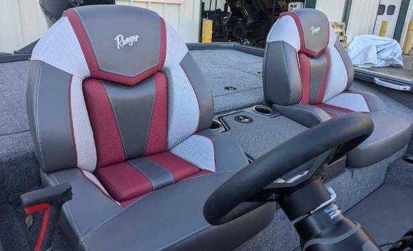 2025 Ranger ALPHA 208 boat seats with red and gray upholstery.
