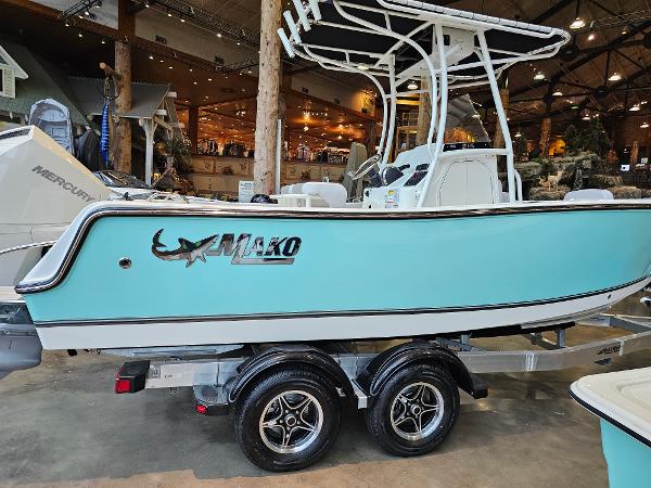 2025 Mako 214 Center Console boat in showroom.