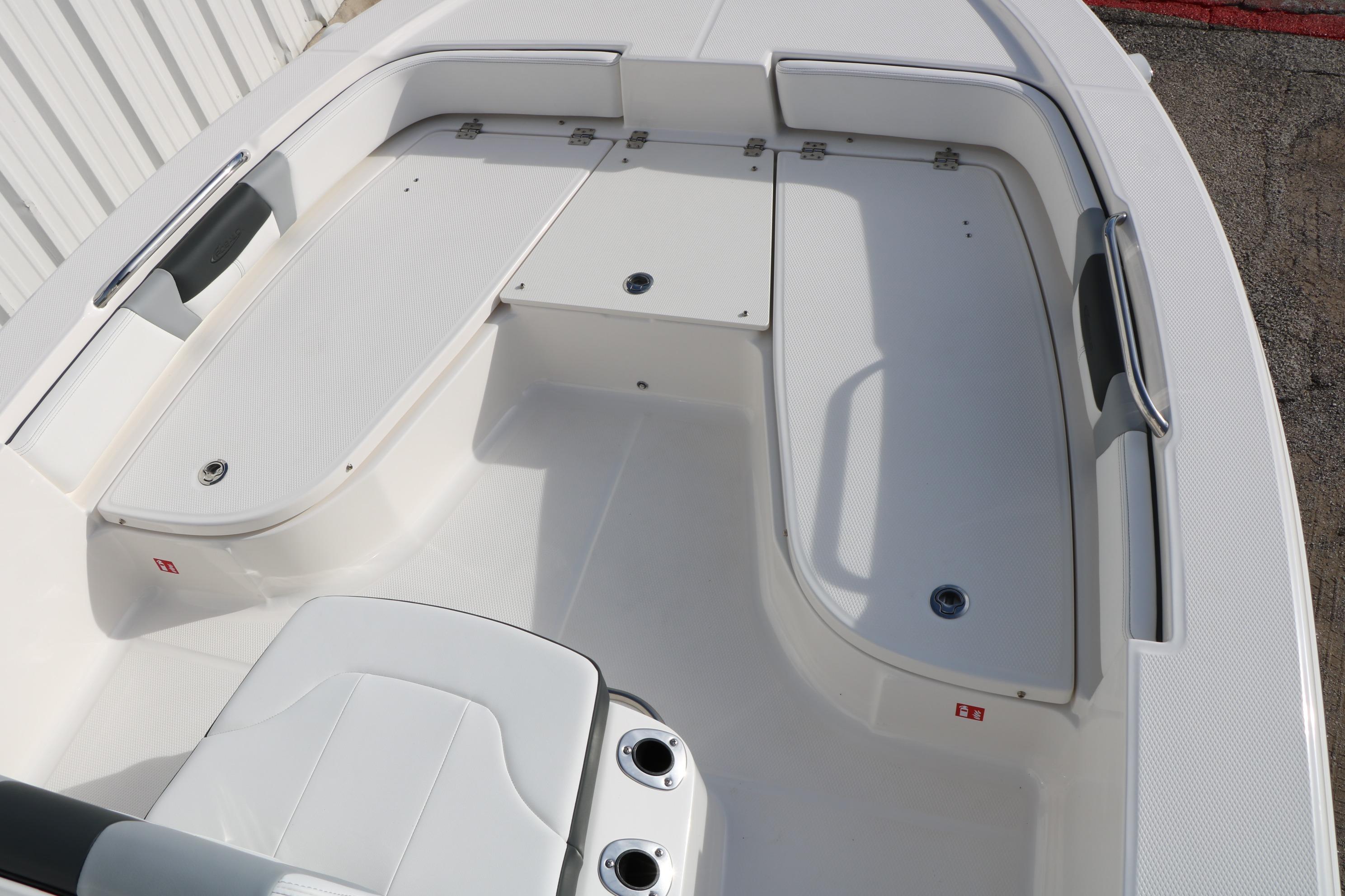 2026 Robalo 206 Cayman boat interior with seating and storage compartments.
