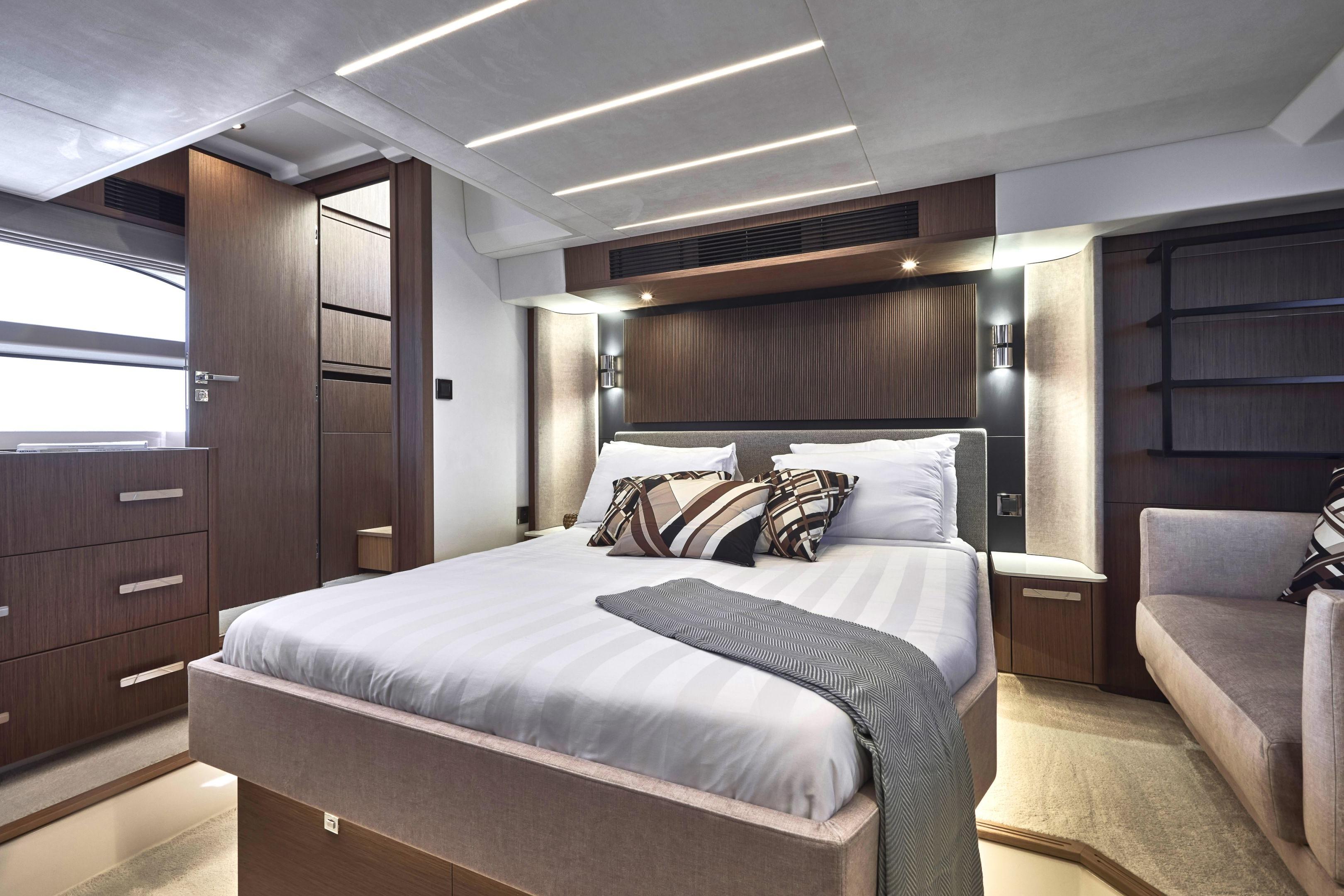 Luxurious bedroom interior of 2026 Prestige X60 yacht, featuring modern design and elegant furnishings.