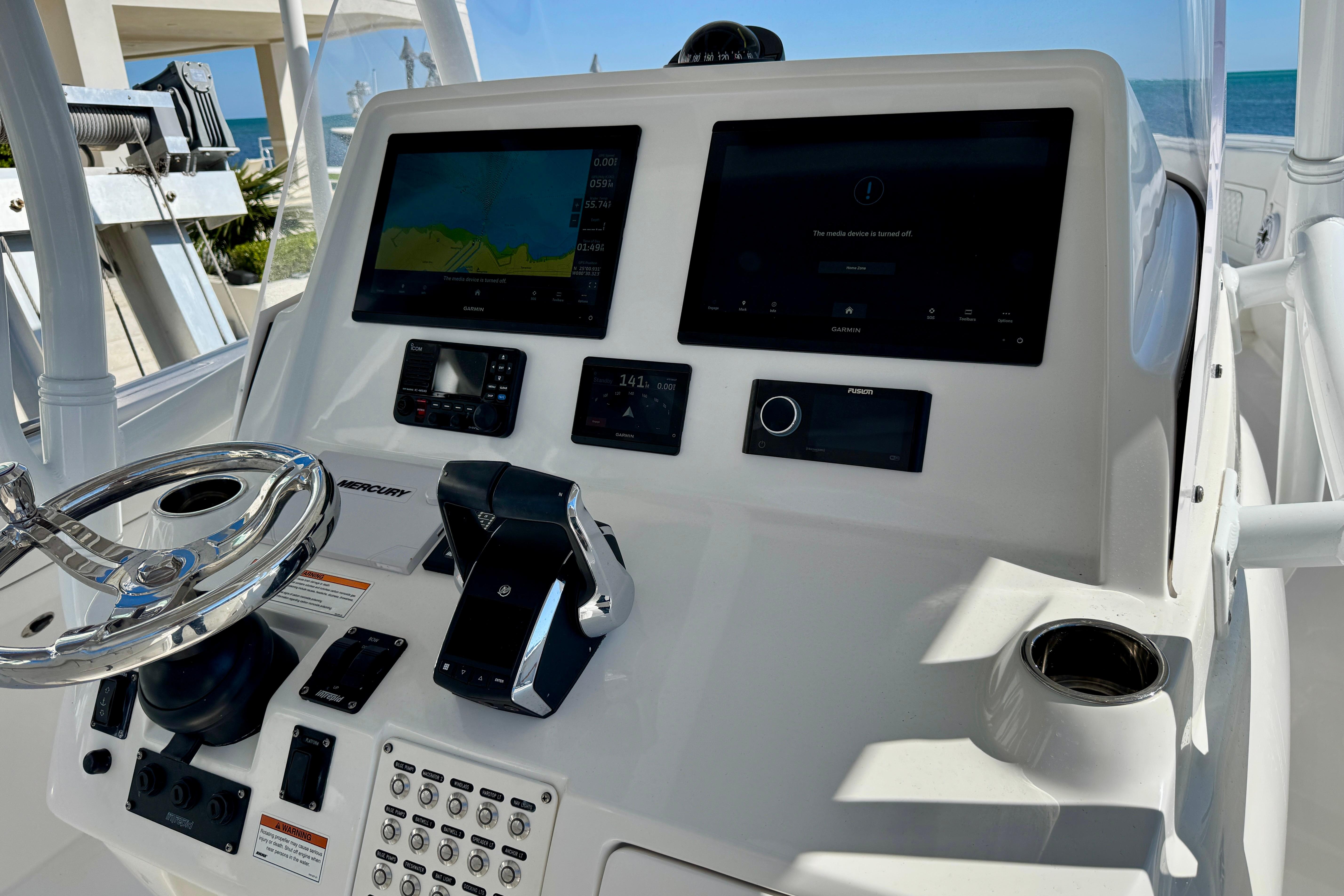 2024 Intrepid 407 Nomad FE boat dashboard with advanced navigation and control systems.