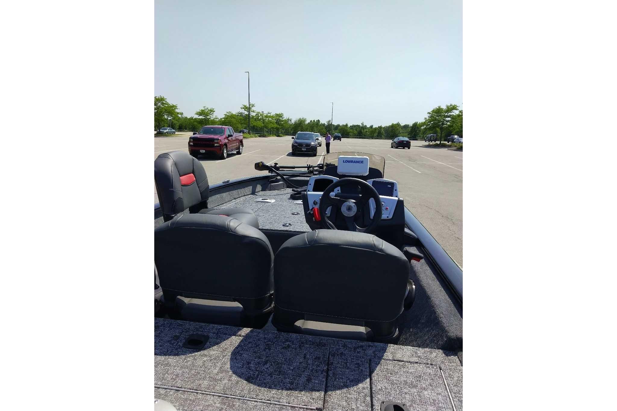 2026 Tracker Pro Team 175 Crappie Edition boat interior in parking lot.