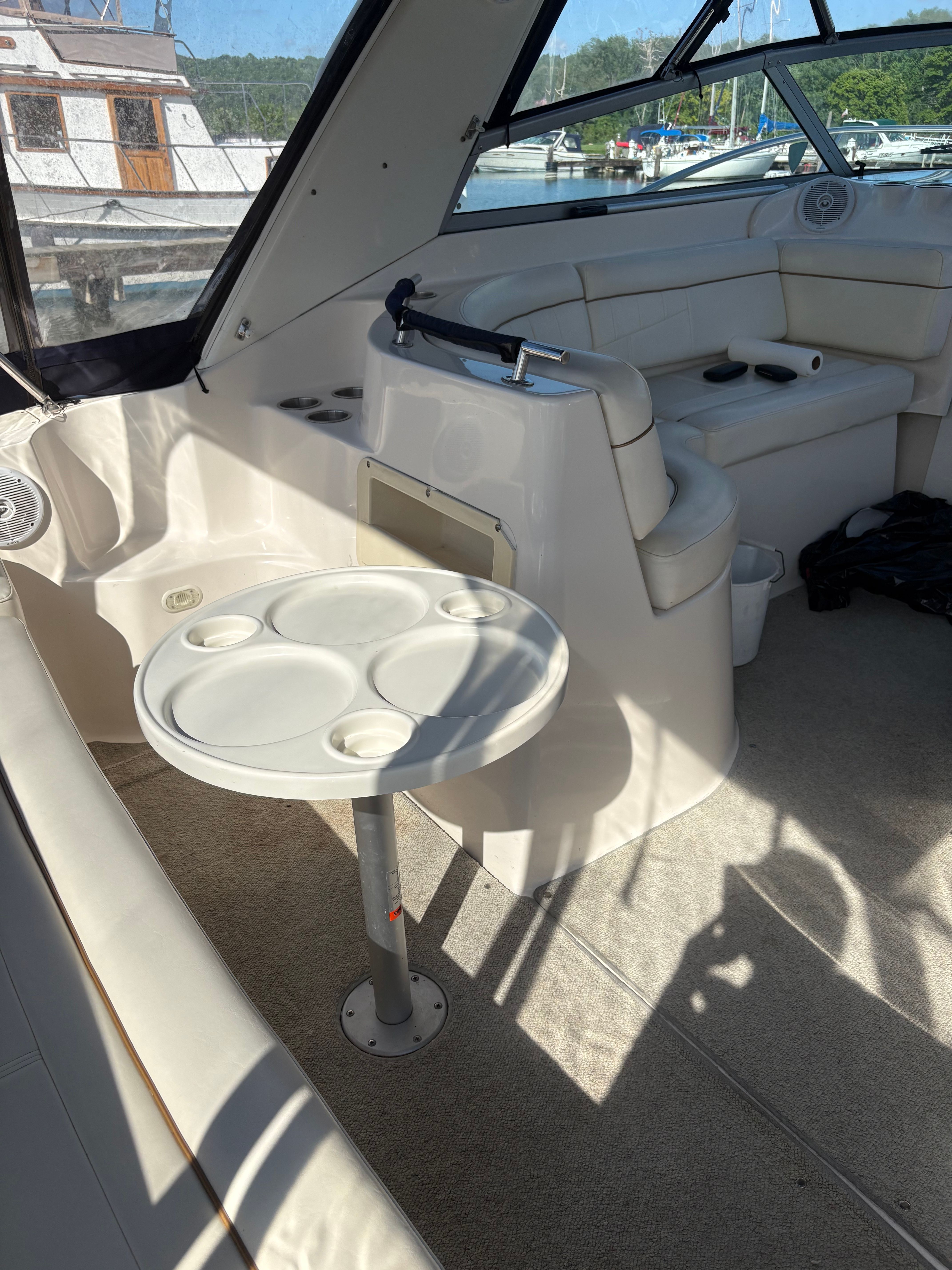 Interior of a 2002 Rinker Fiesta Vee 342 yacht with seating area.