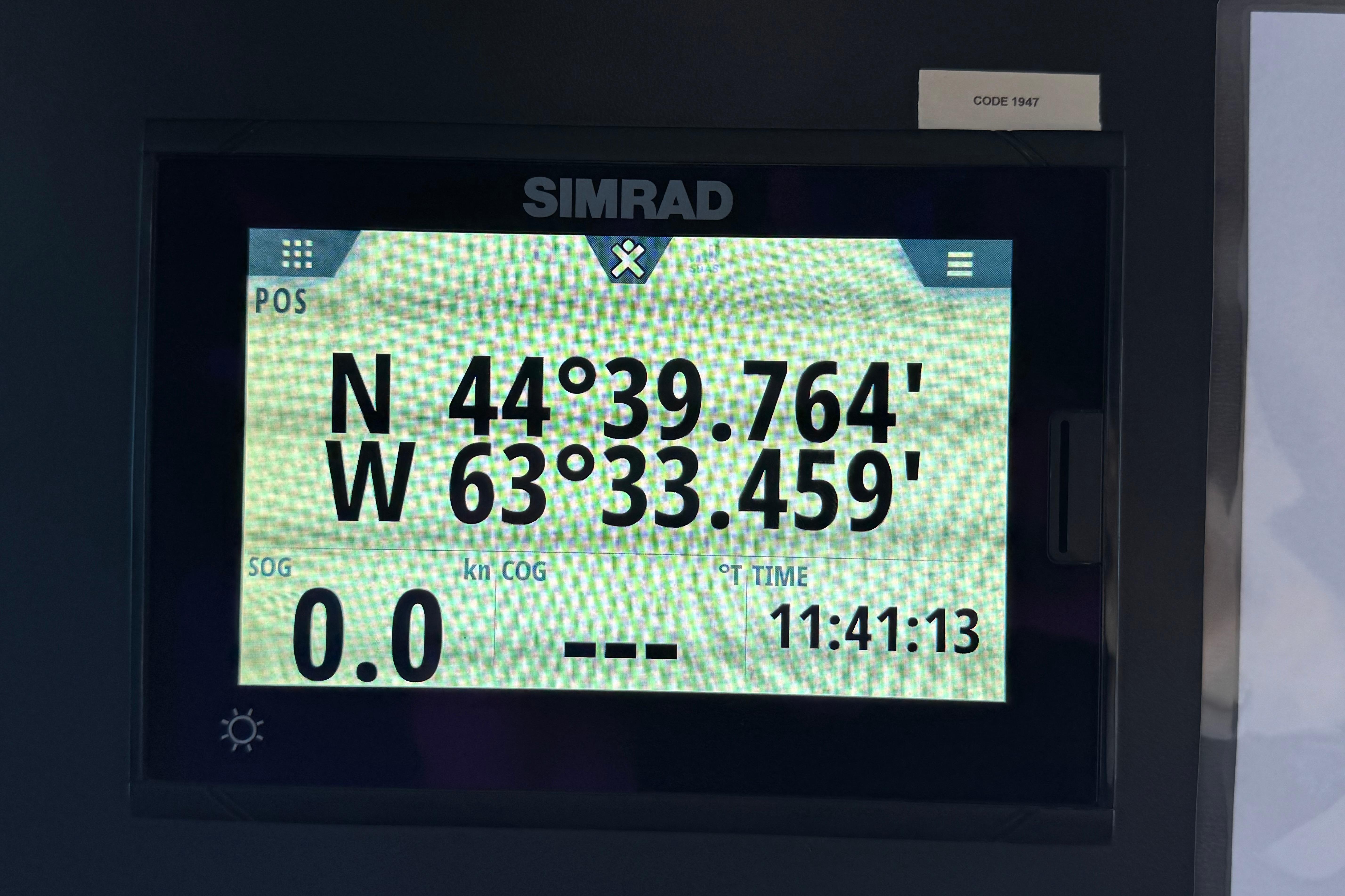GPS display showing coordinates N 44°39.764', W 63°33.459', time 11:41:13.