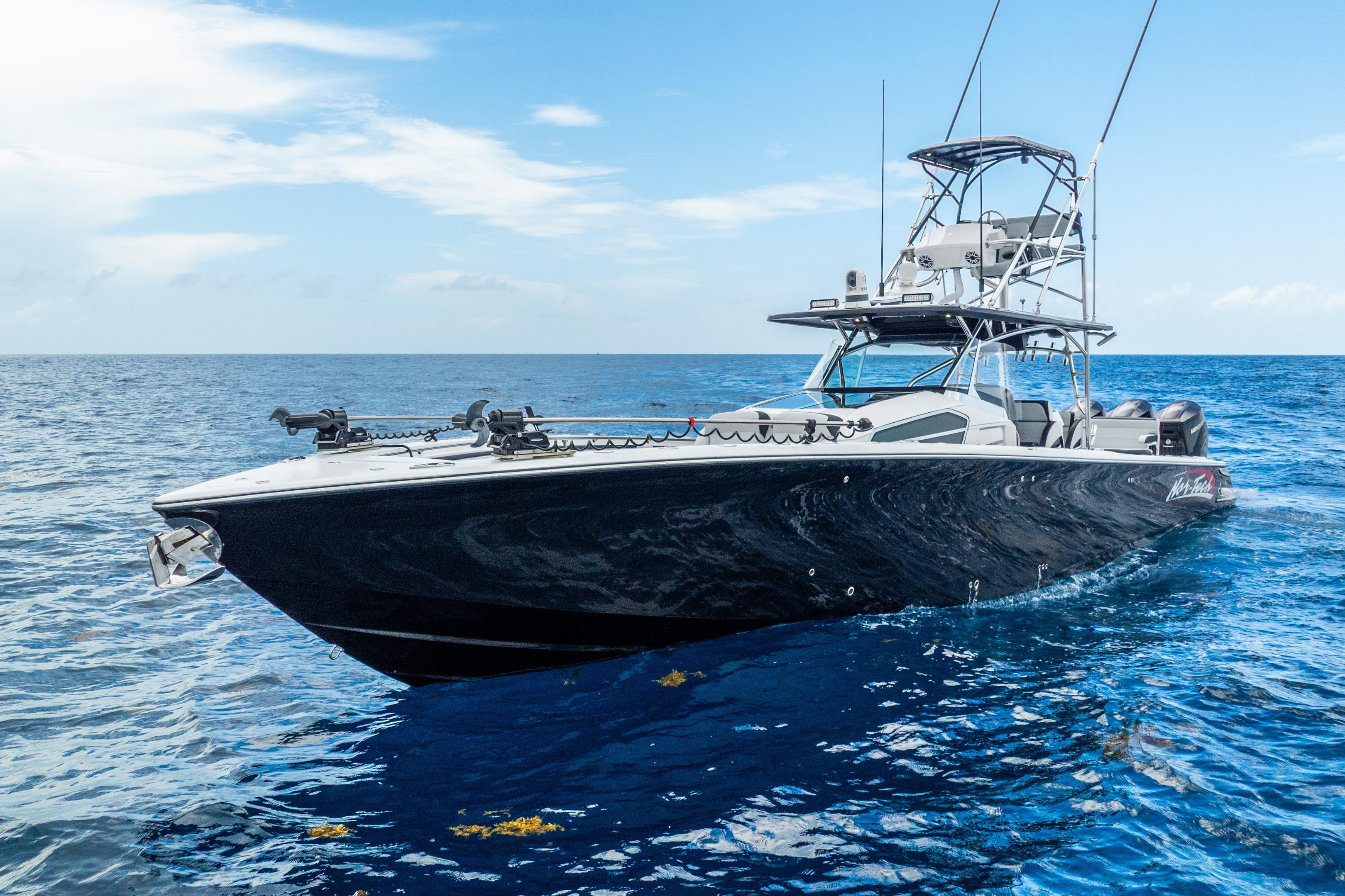 2024 Nor-Tech 452 Super Fish boat on open ocean, showcasing sleek design and advanced features.