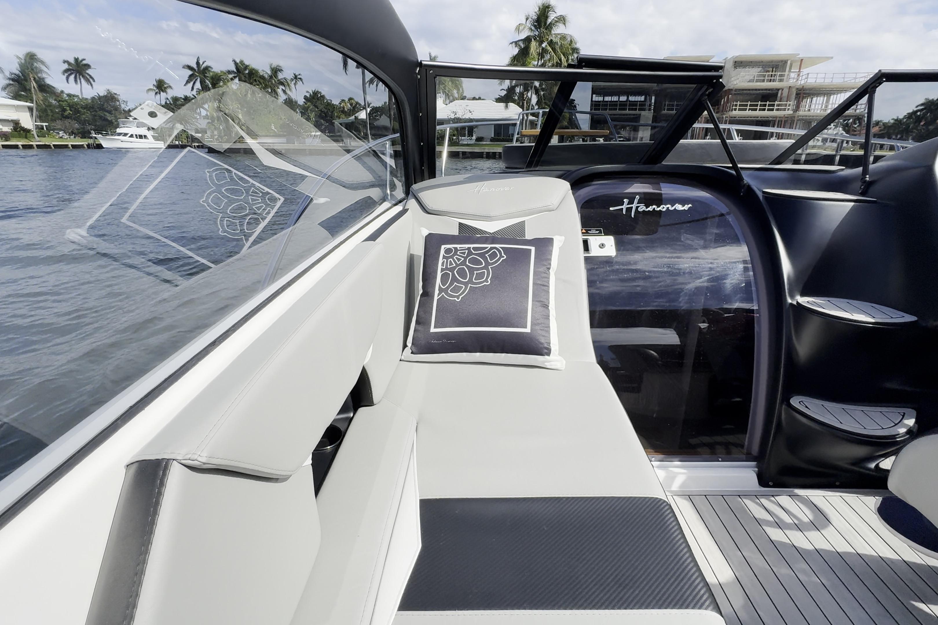 Luxurious Hanover 305 yacht interior, 2027 model, featuring sleek seating and elegant design.