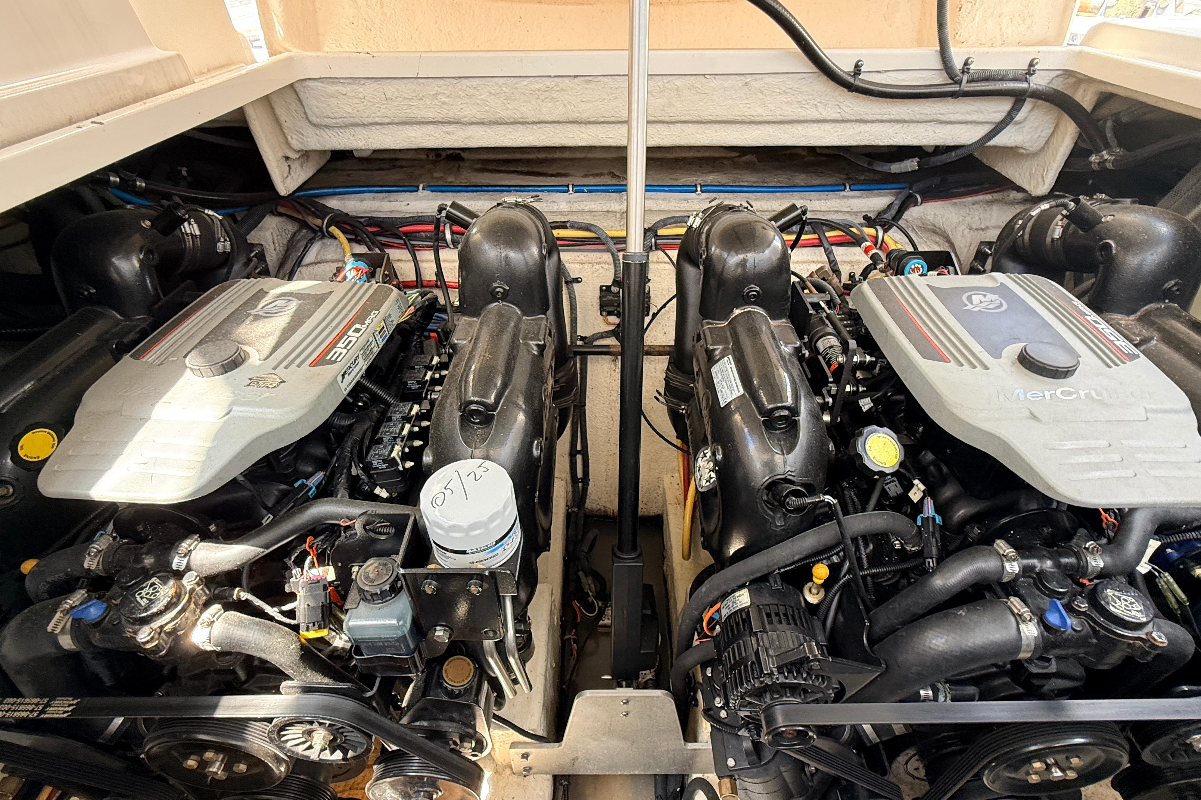 Engine compartment of a 2011 Monterey 320 Sport Yacht with dual MerCruiser engines.