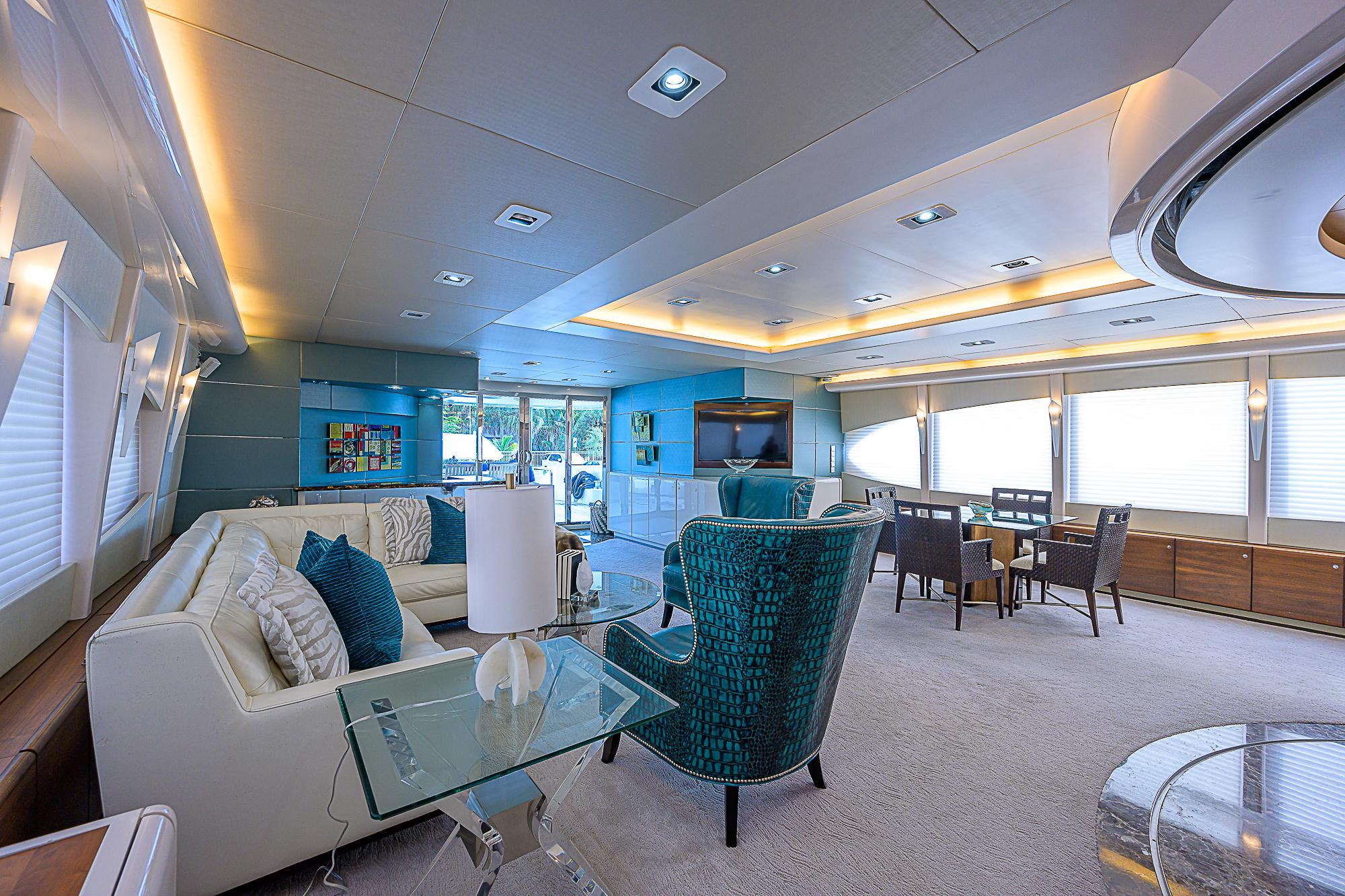 Luxurious interior of 2005 DMB Danube Motor Yacht with elegant seating and modern decor.
