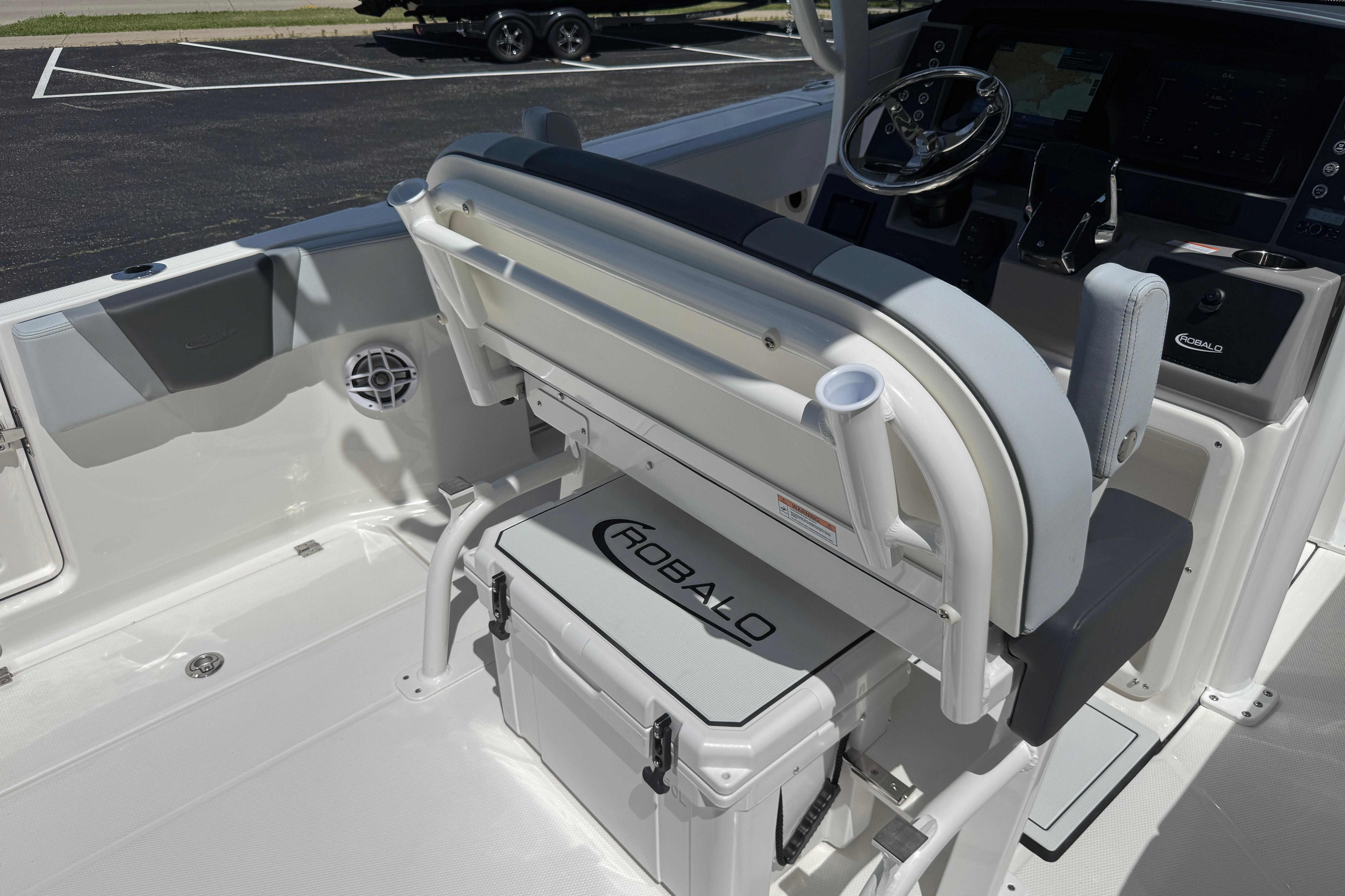 2026 Robalo R250 Center Console boat interior with seating and steering console.