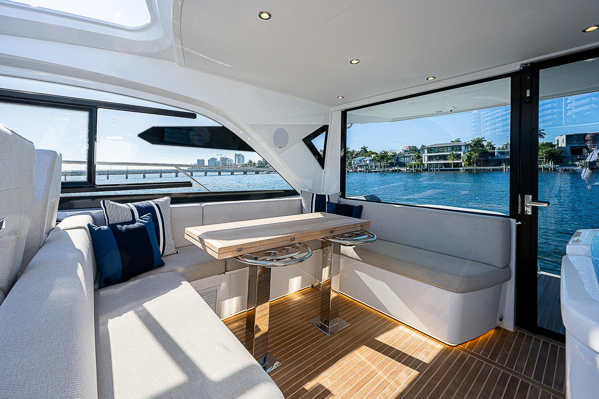 Interior of 2022 Beneteau Gran Turismo 45 yacht with waterfront view.