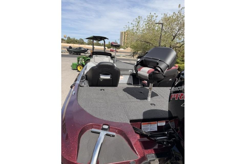 2026 Nitro Z18 boat with seating and Mercury Pro engine, parked outdoors.