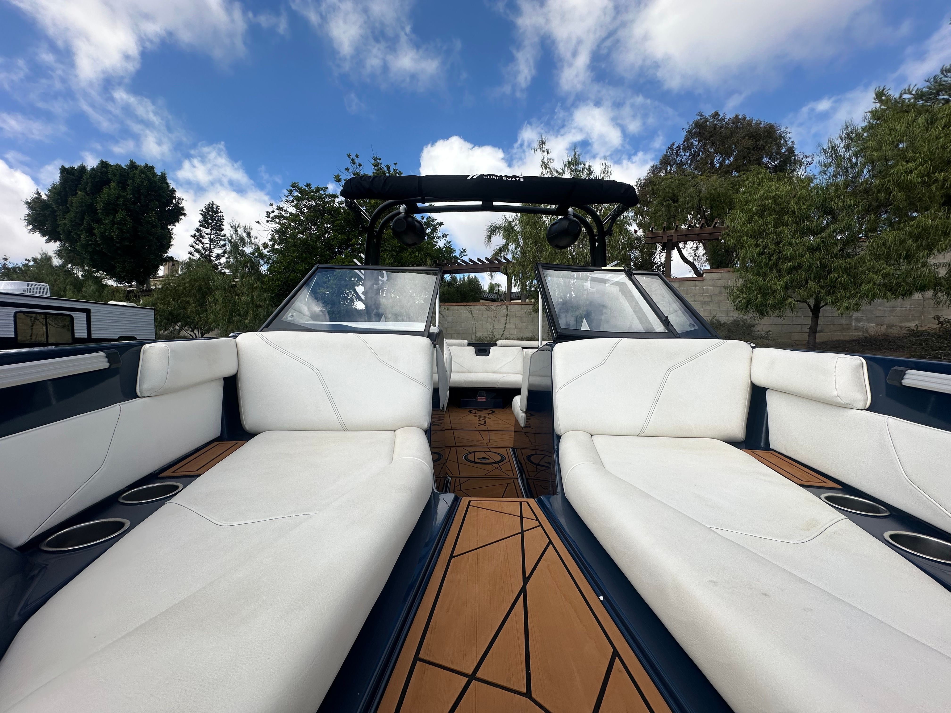 Interior of a 2021 ATX Surf Boats 22 Type-S with white seating.