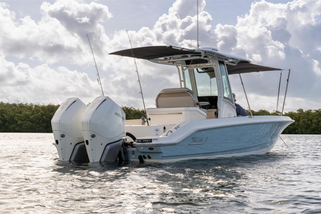 2024 Boston Whaler 280 Dauntless boat with twin engines on calm water.