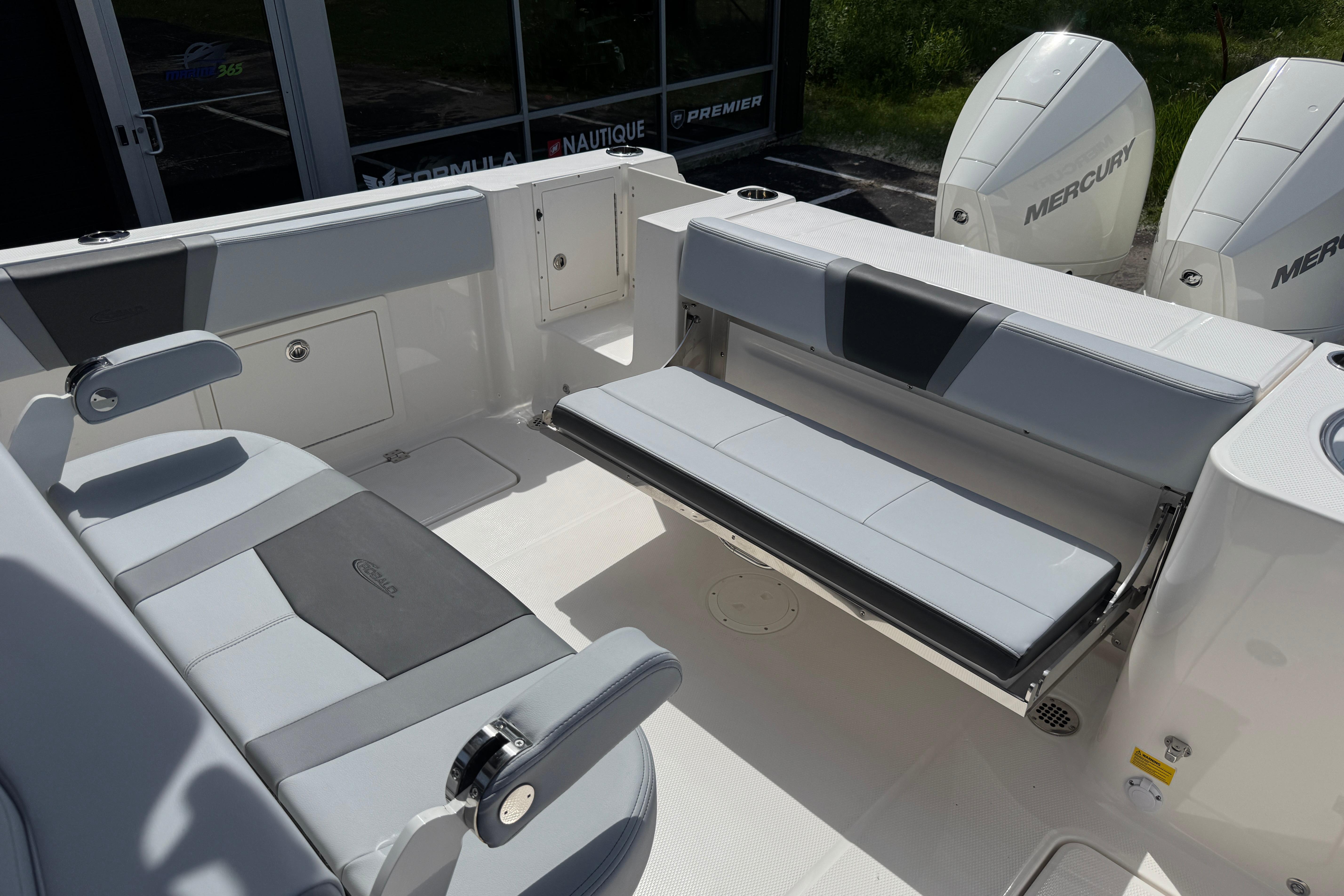 2026 Robalo R250 Center Console boat interior with seating and Mercury engines.