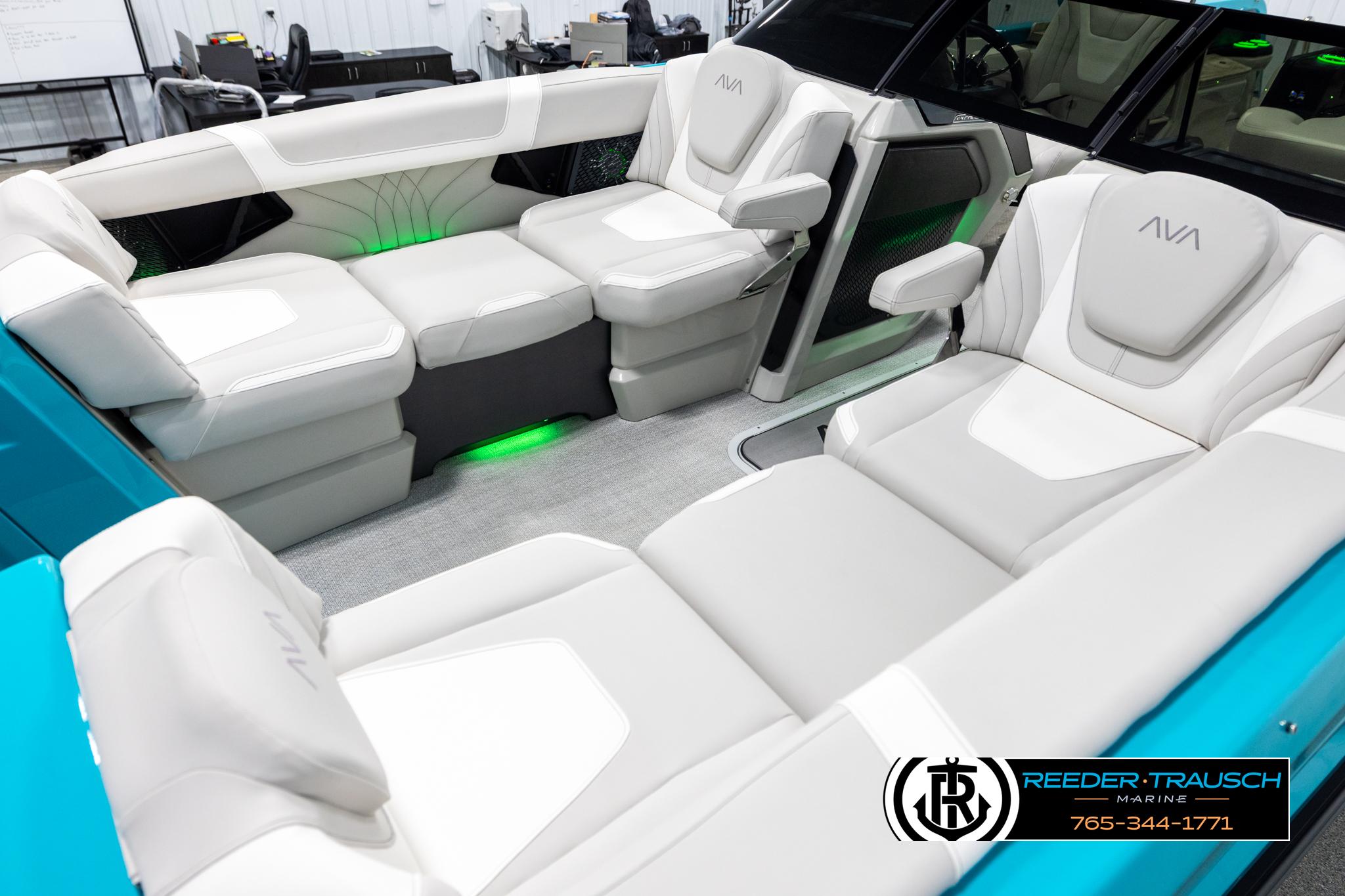 Luxurious interior of 2025 Avalon 2585 Excal VRBW boat with plush seating and ambient lighting.