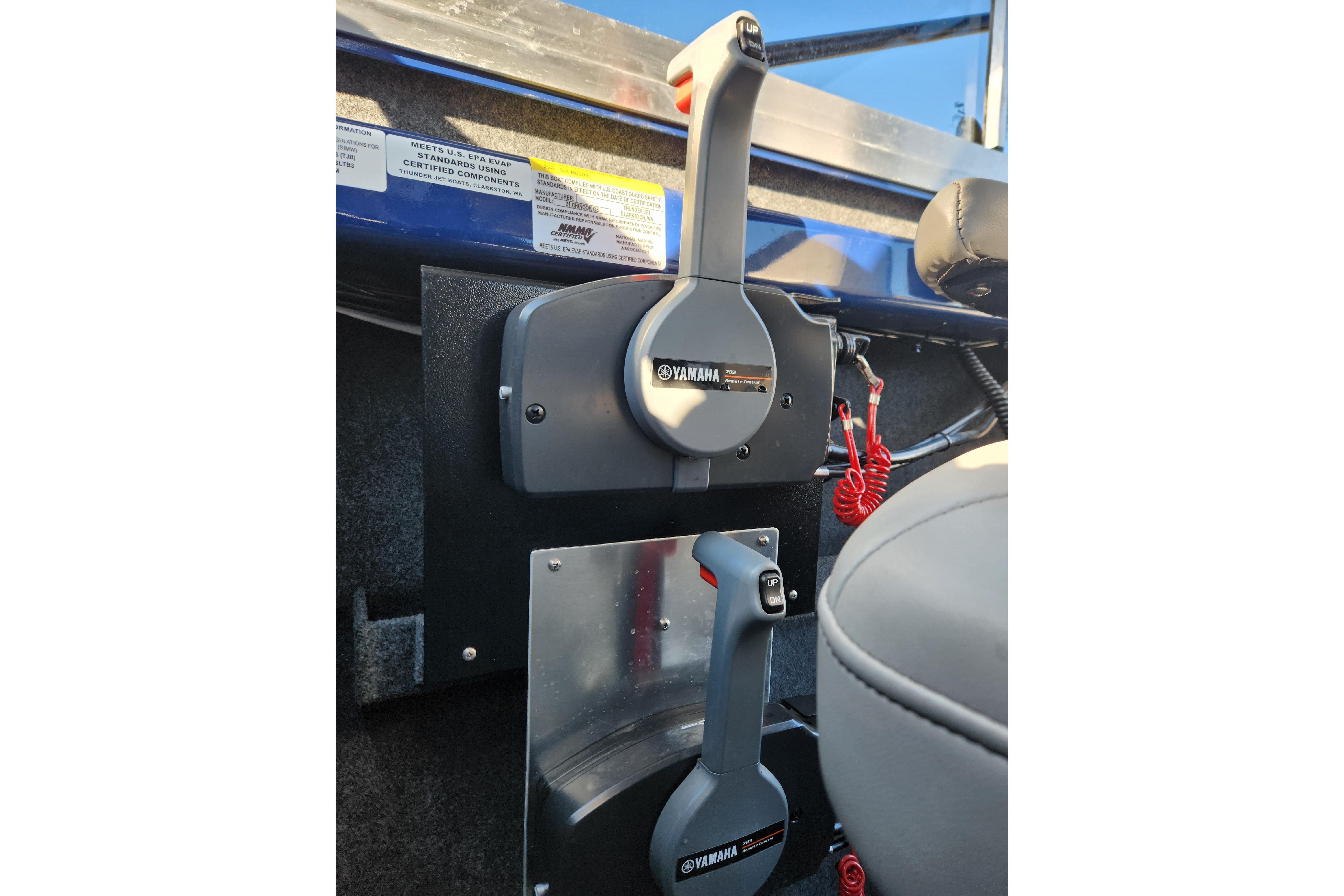 Throttle controls inside a 2025 Thunder Jet 21 Chinook OS boat cockpit.