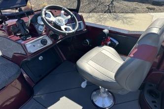Interior of 2026 Nitro ZV20 Pro boat with steering wheel and seat.