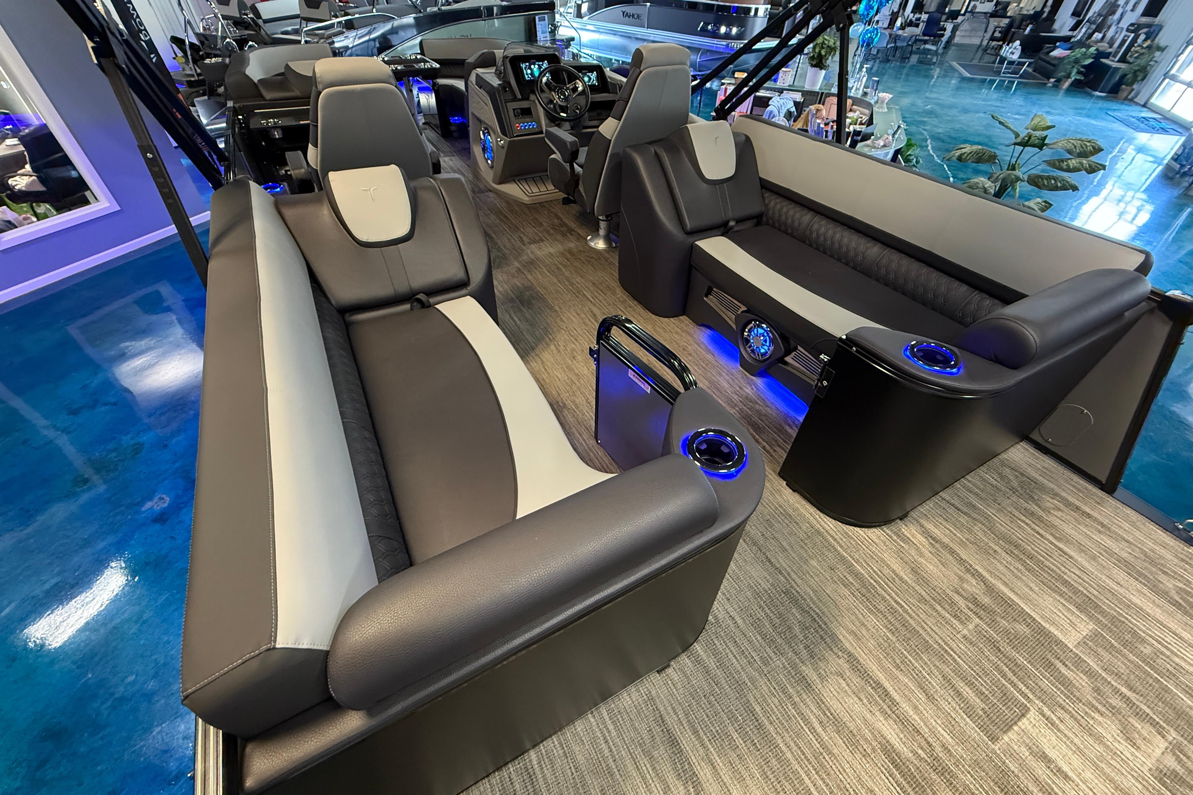 2026 Tahoe Pontoon Cascade Cruise Rear Bench with modern seating and blue LED lighting.