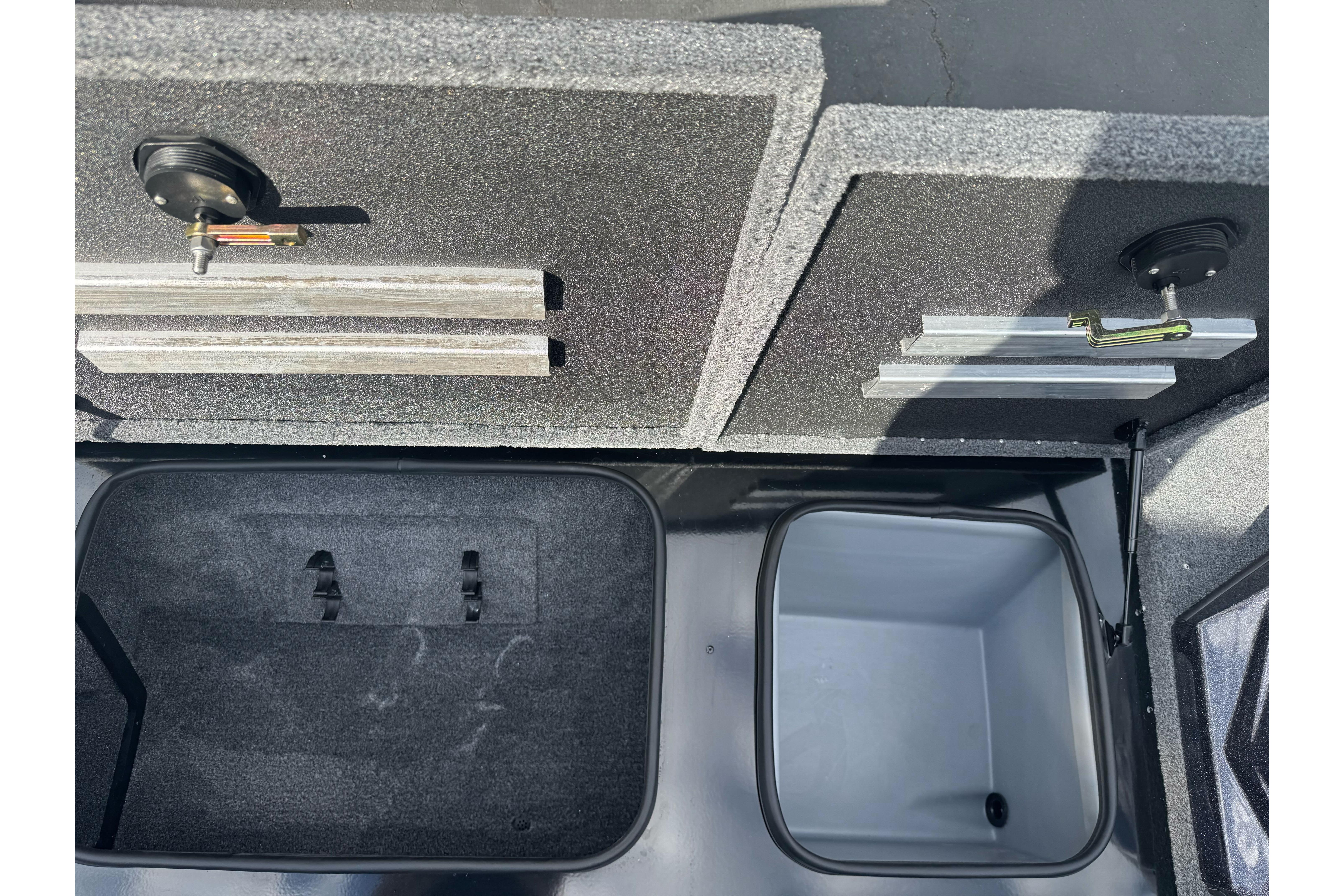 Interior compartments of 2026 Ranger ALPHA 208, featuring storage and utility spaces.