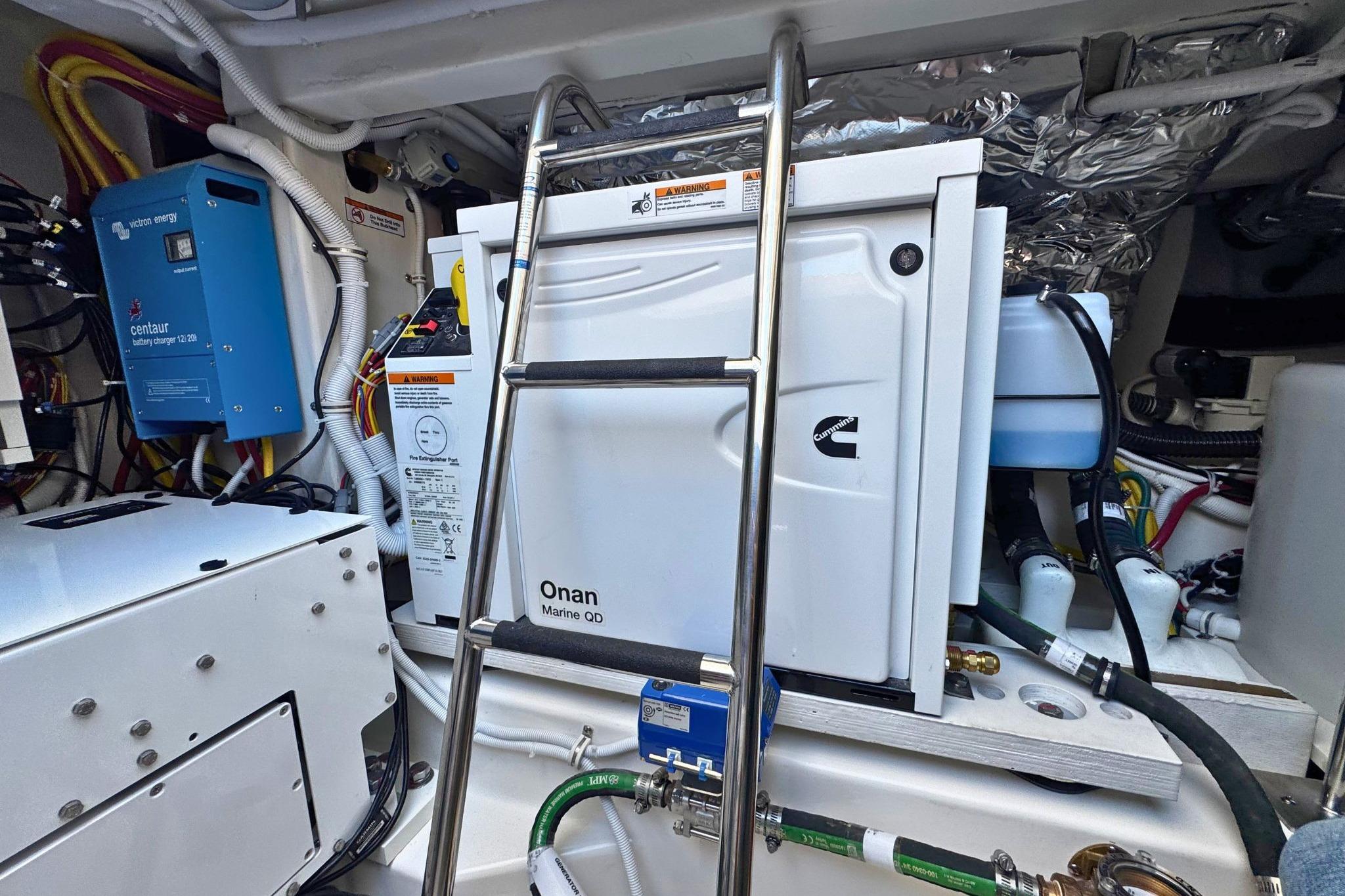 Engine room of 2027 Tiara Yachts 39 LE with Onan Marine QD generator.
