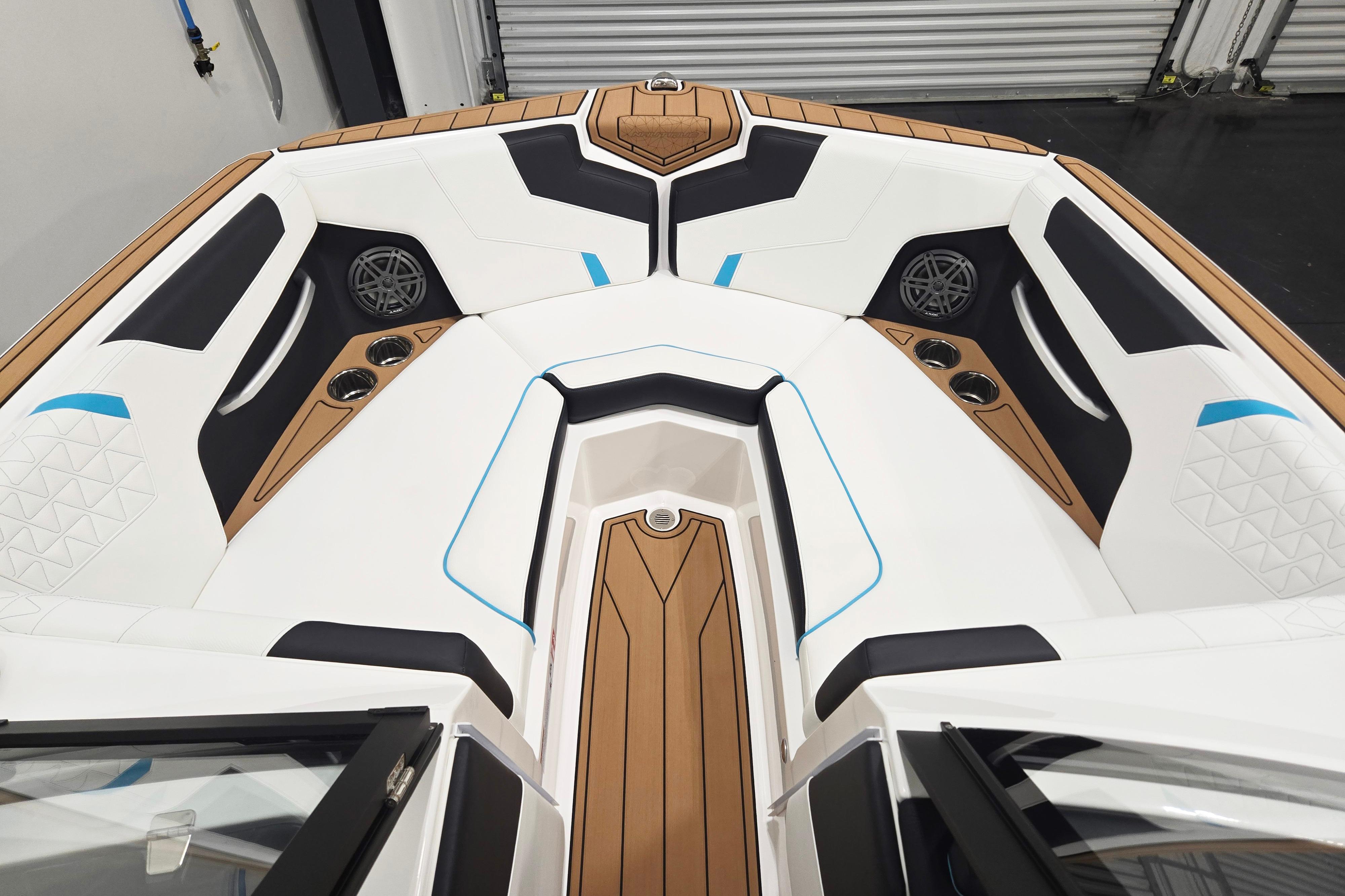 2026 Nautique Super Air Nautique GS22 boat interior with luxurious seating and modern design.