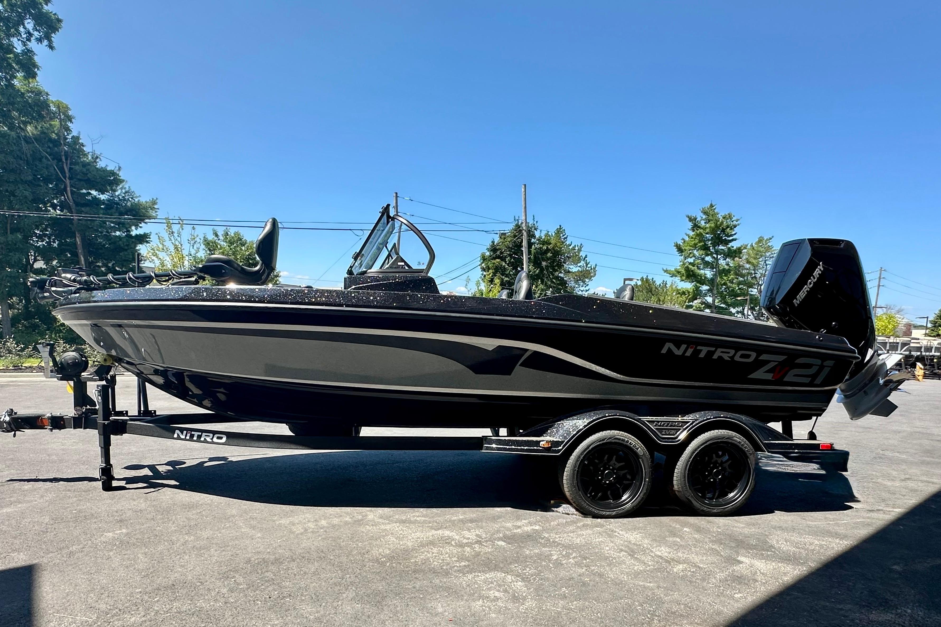 2025 Nitro ZV21 Pro boat on trailer, sleek design, parked outdoors.