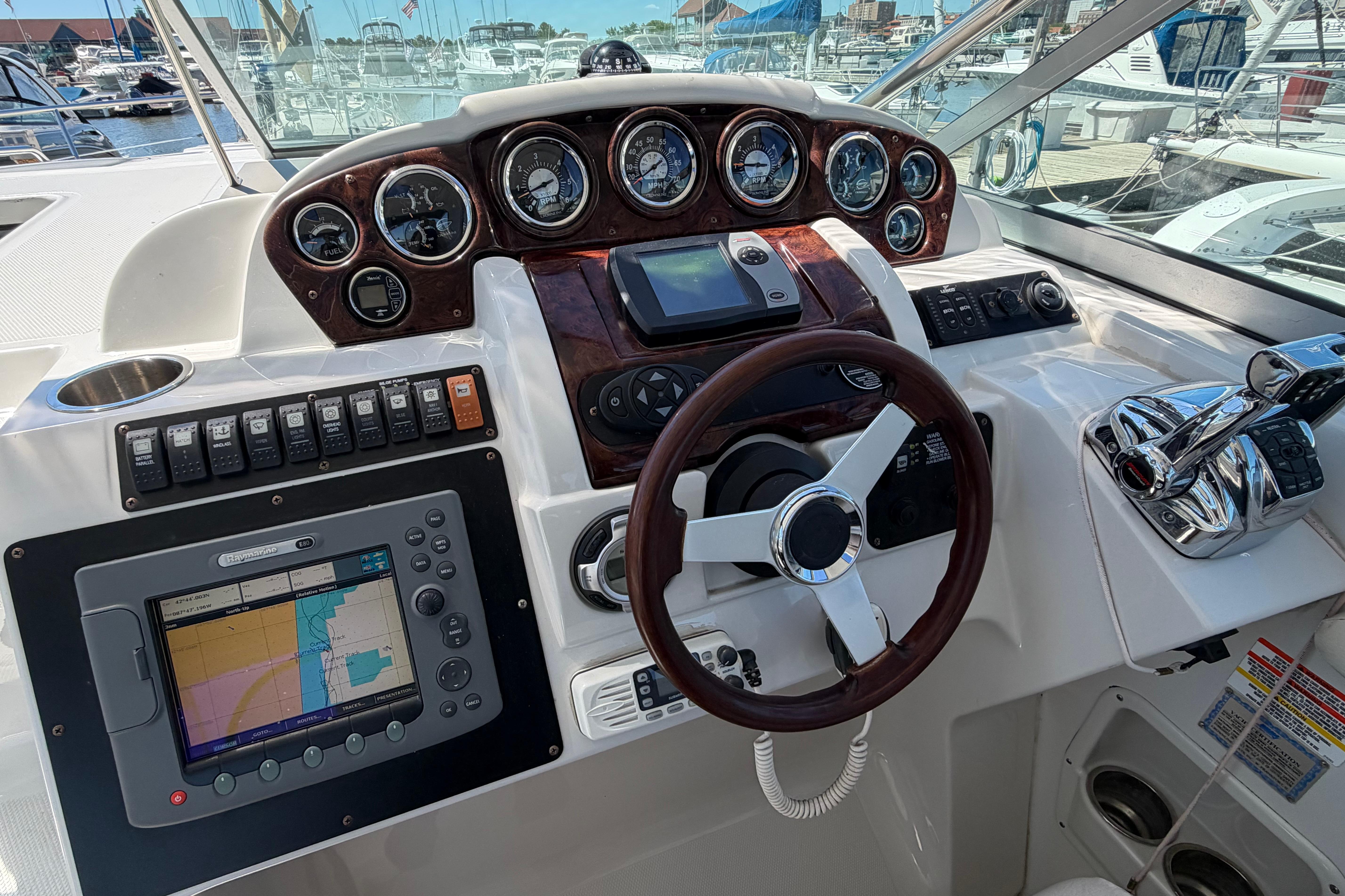 Cockpit of 2008 Crownline 340 CR boat with navigation and control instruments.
