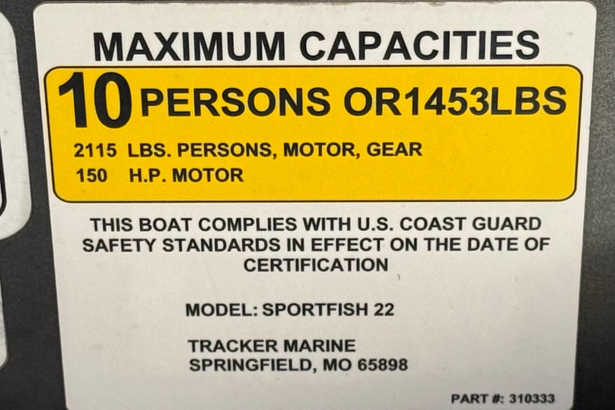 2018 Sun Tracker SportFish 22 DLX capacity label, 10 persons or 1453 lbs, 150 HP motor.