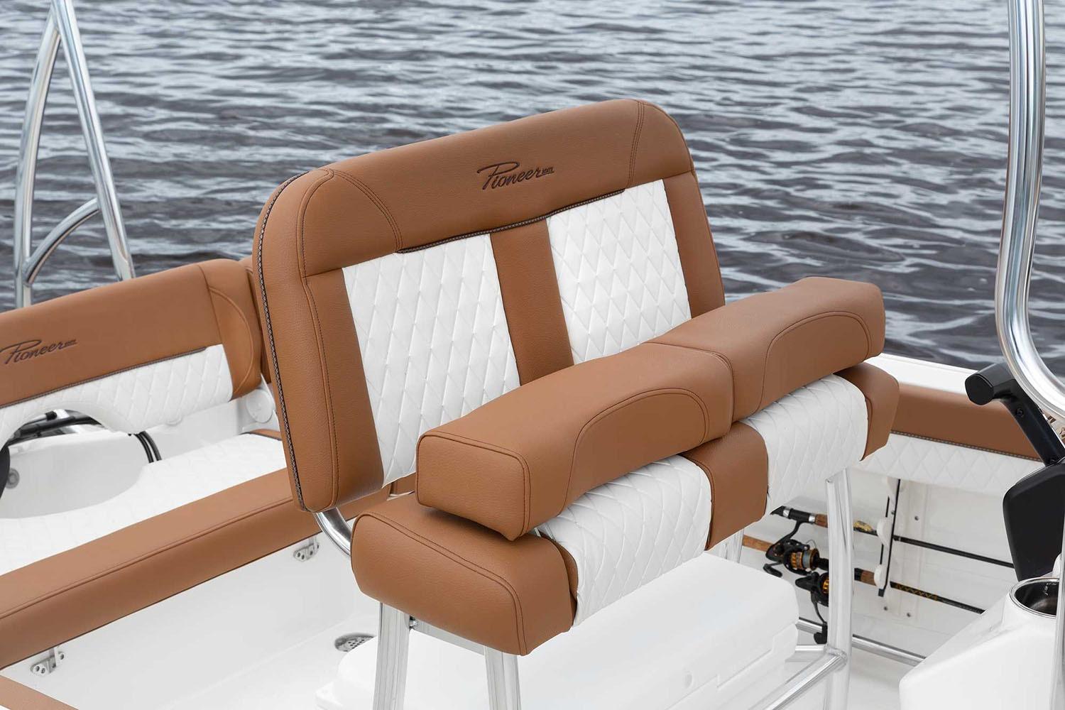 Manufacturer Provided Image: 2025 Pioneer 202 Islander boat seat with brown and white upholstery on water.