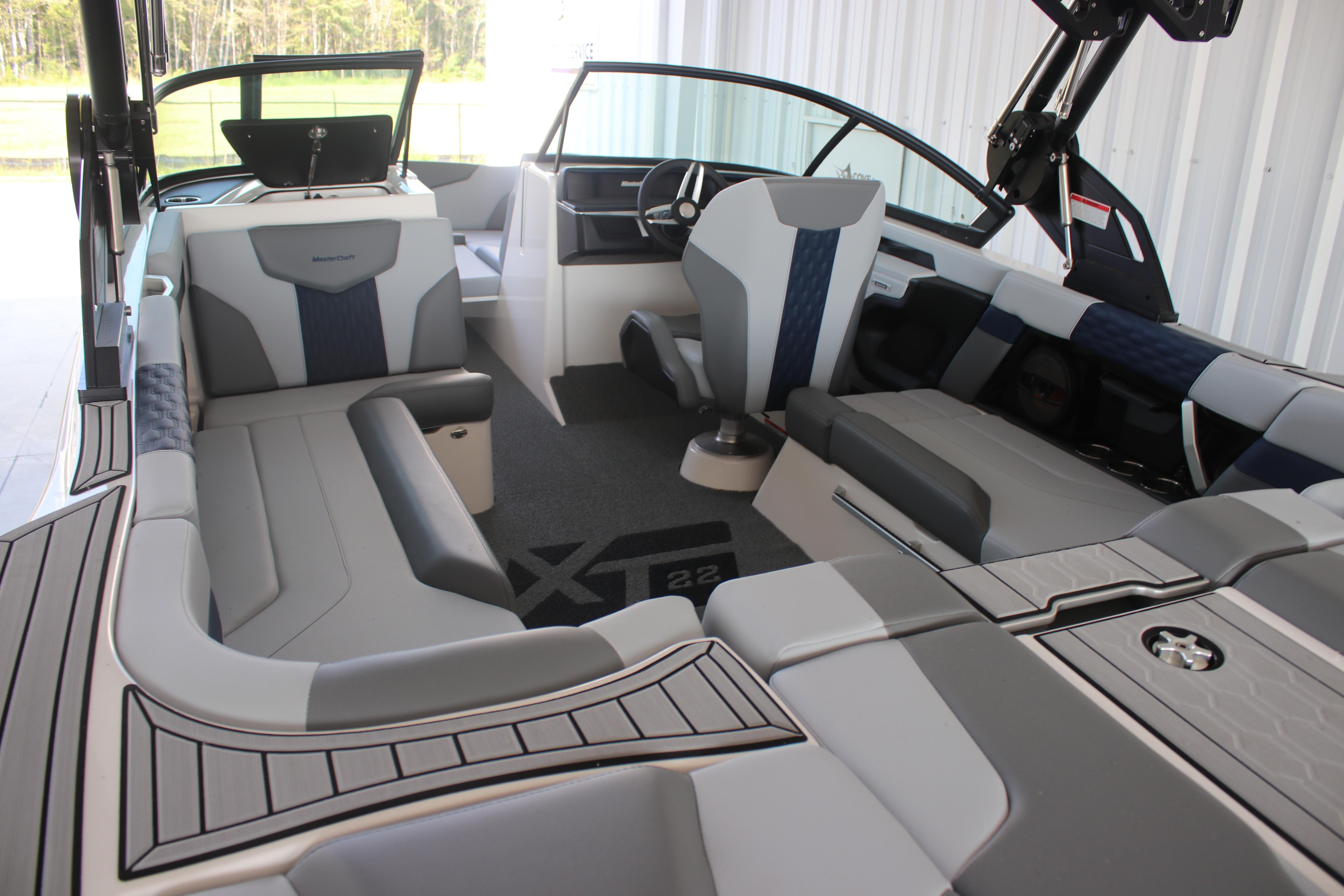 2025 MasterCraft XT22 boat interior with luxurious seating and modern design.