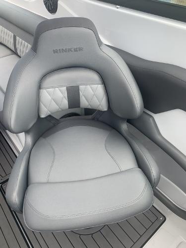 2020 Rinker 29QX BR boat seat with gray upholstery.