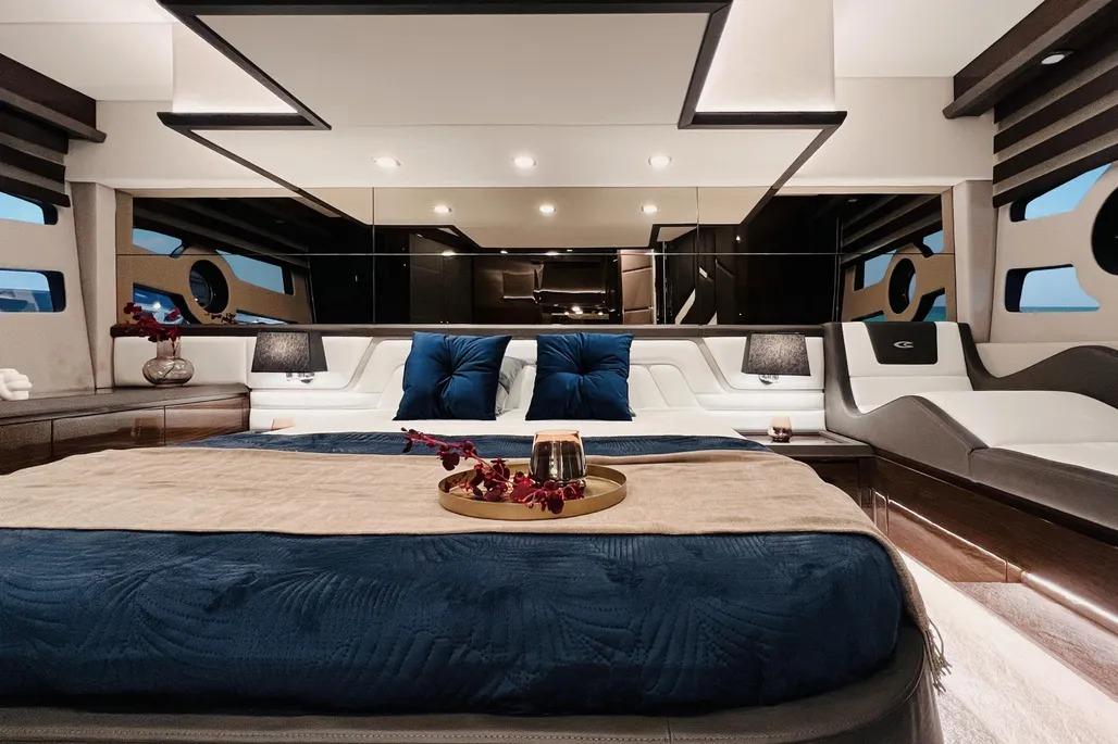 Luxurious interior of 2025 Cobrey 52 FLY yacht with elegant bedroom design.