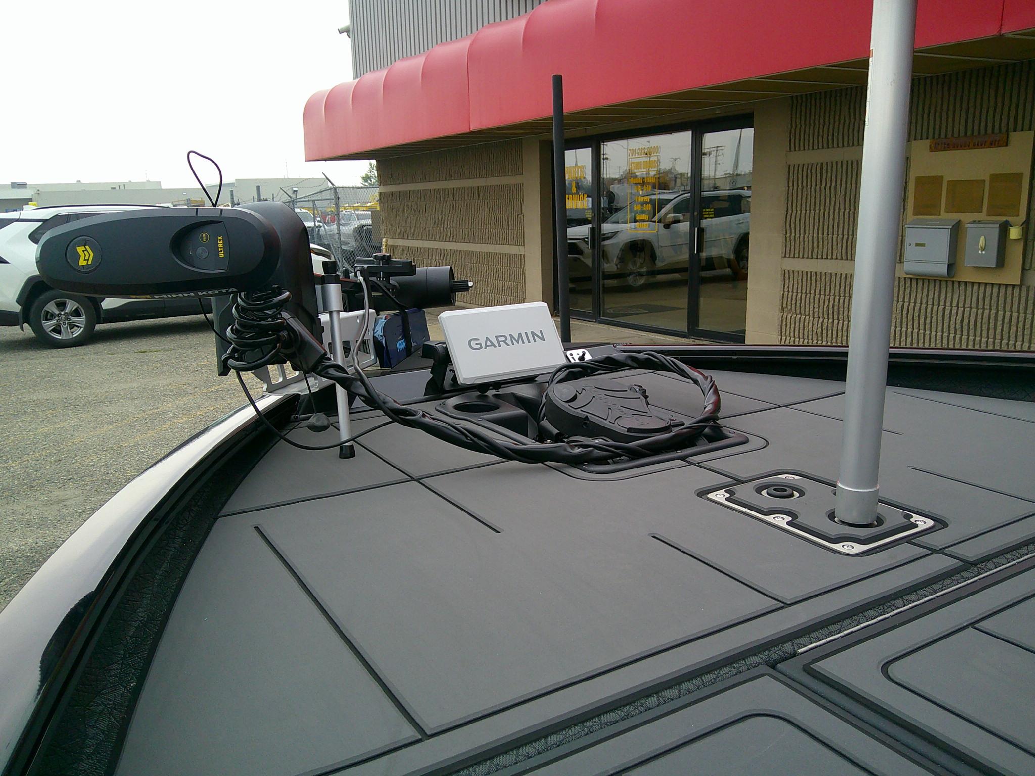 2025 Tracker Savage 215 boat with Garmin navigation system and trolling motor.