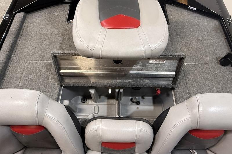 2016 Tracker Pro Team 175 TXW boat interior with gray and red seating.