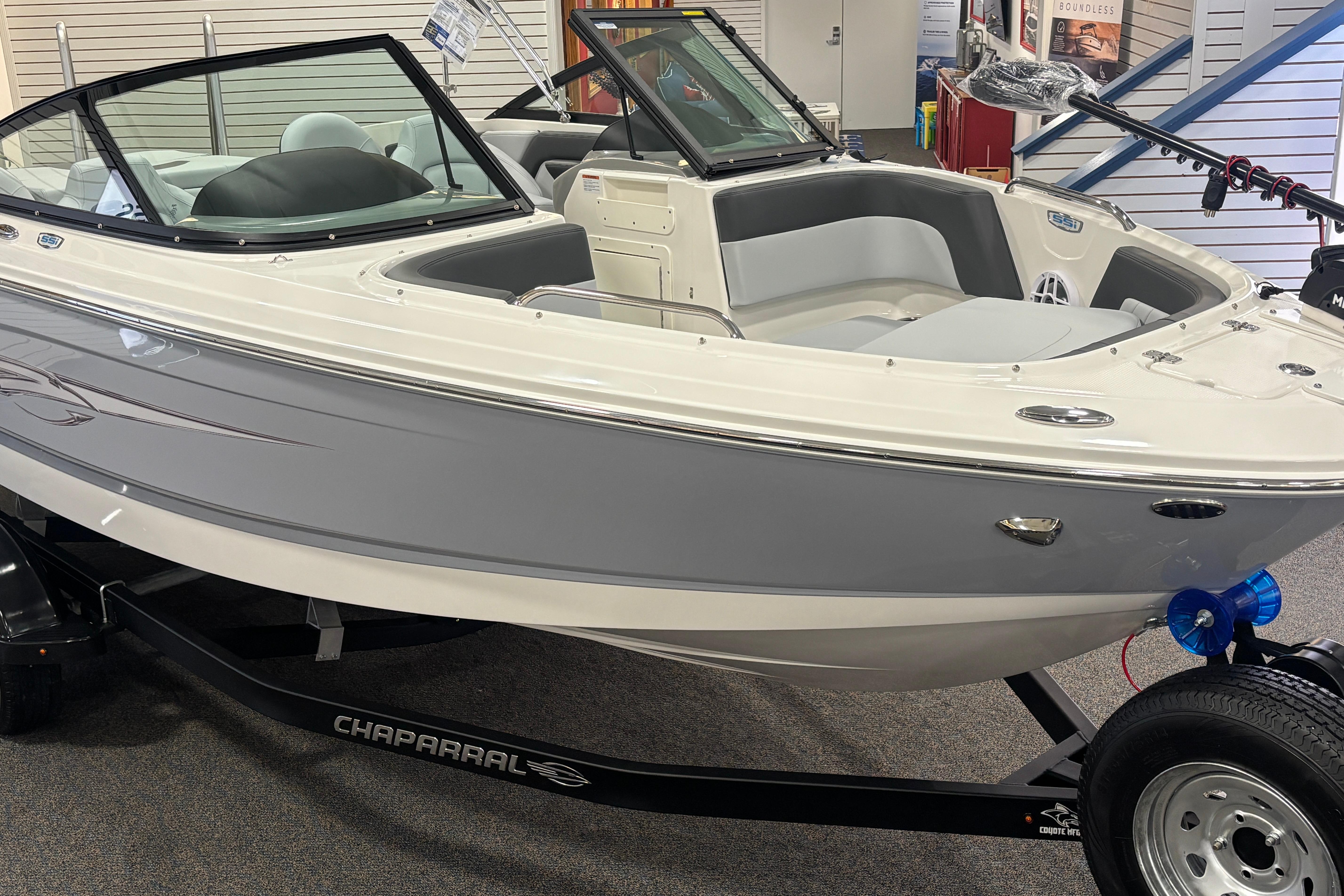 2026 Chaparral 21 SSi Ski & Fish boat in showroom.