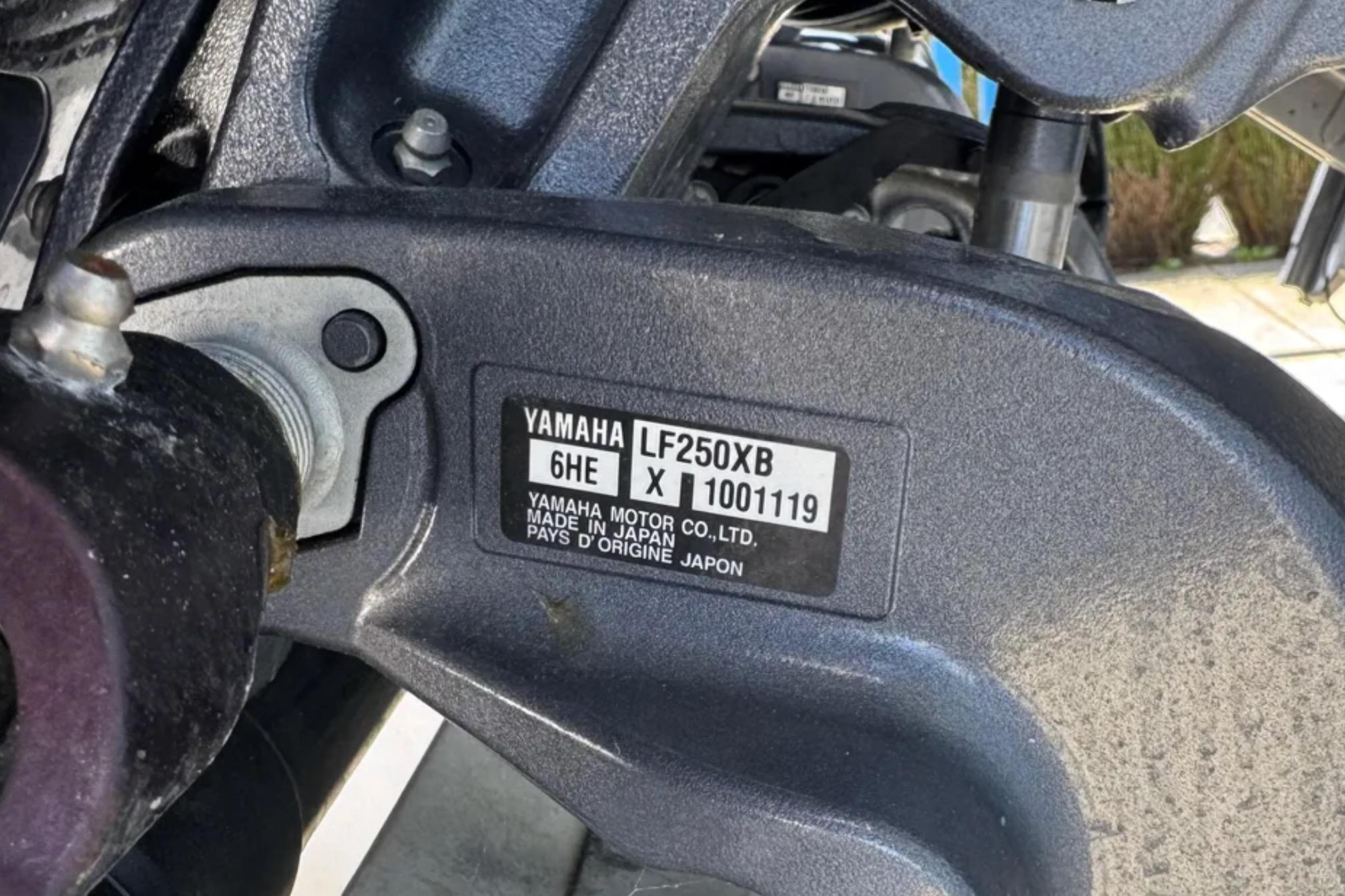 Close-up of Yamaha LF250X engine part on 1990 Grady-White Marlin 280 boat.