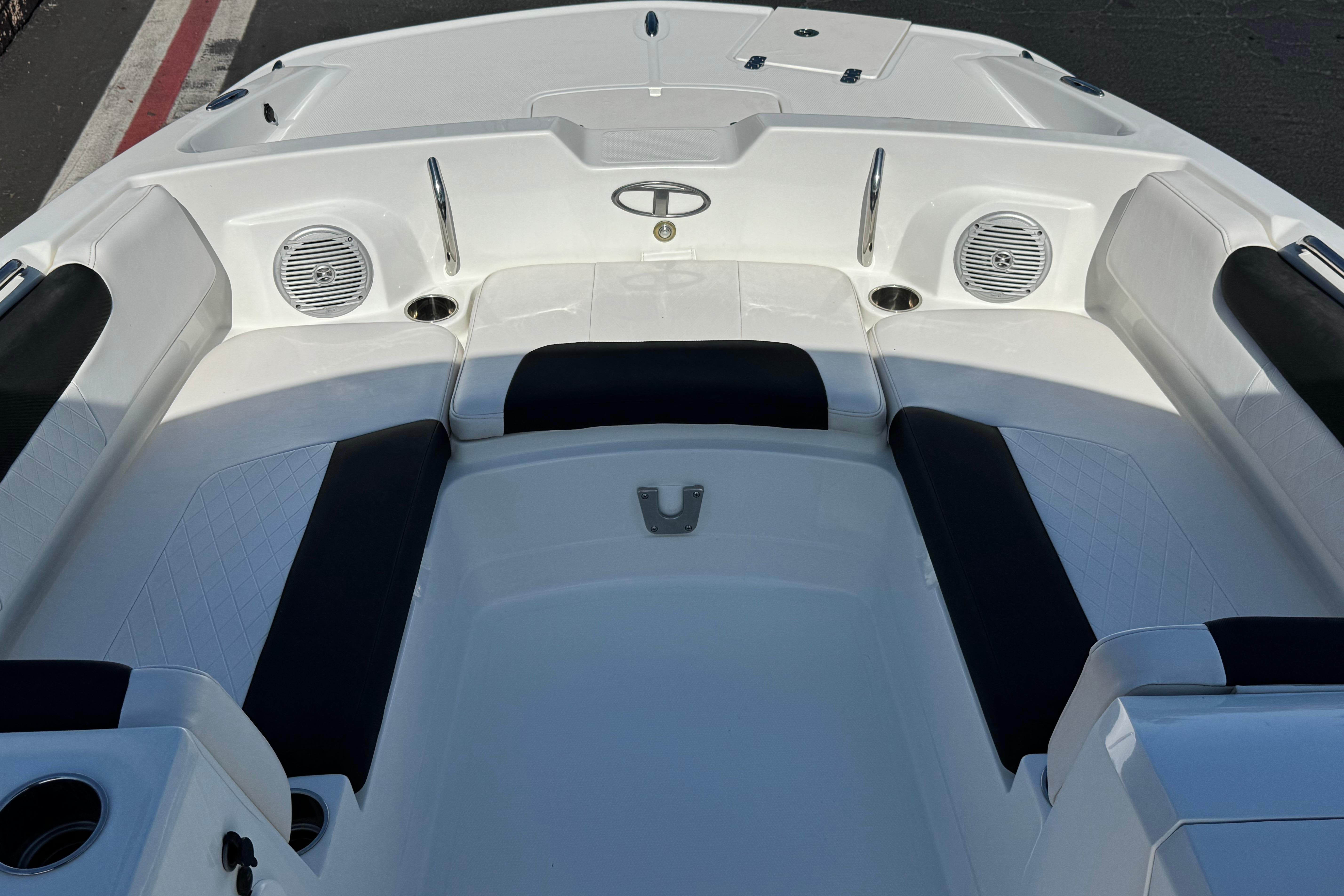 2019 Tahoe 2150 boat interior with white seating and black accents.