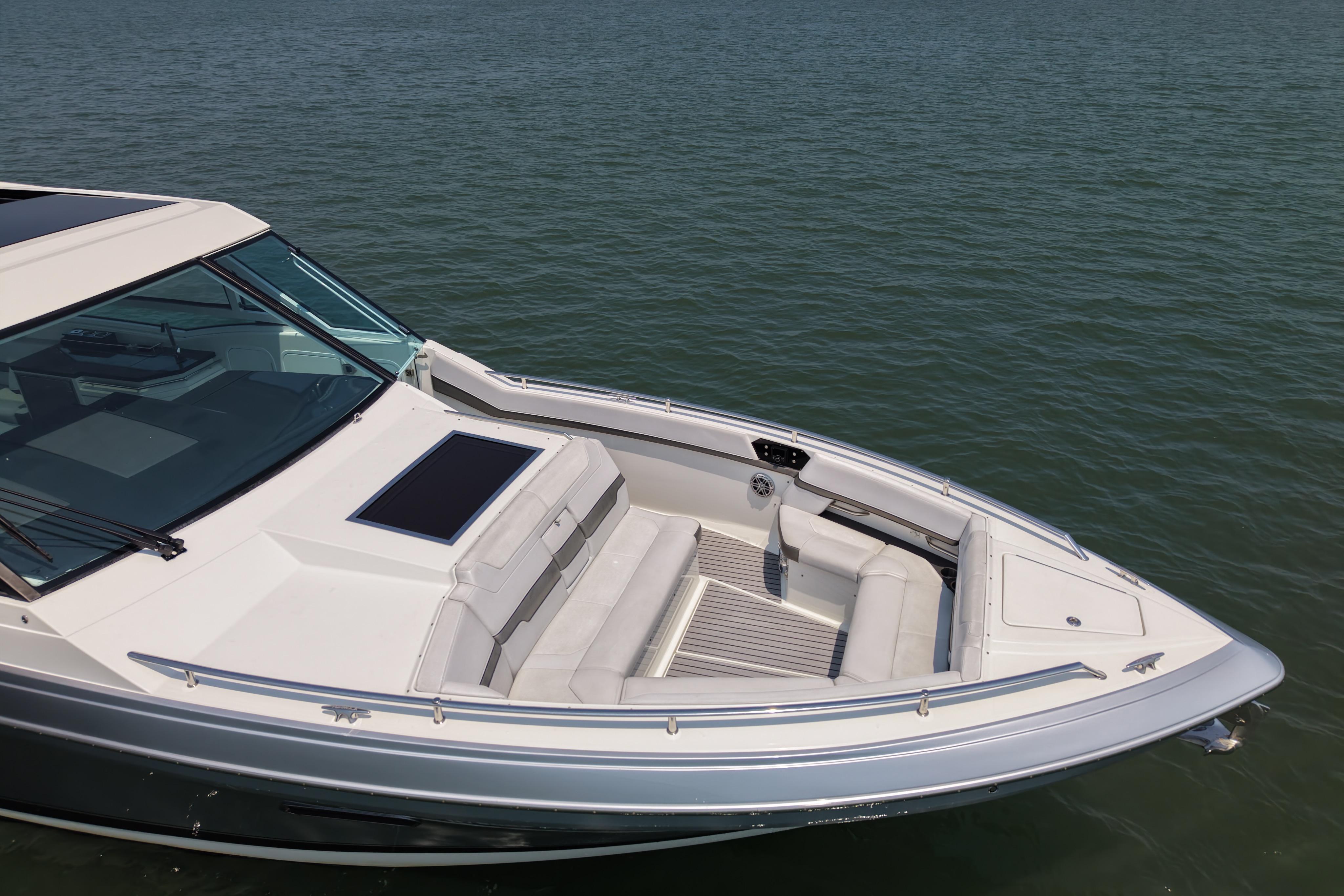 2019 Formula 430 Super Sport Crossover boat on calm water, featuring sleek design and spacious seating.