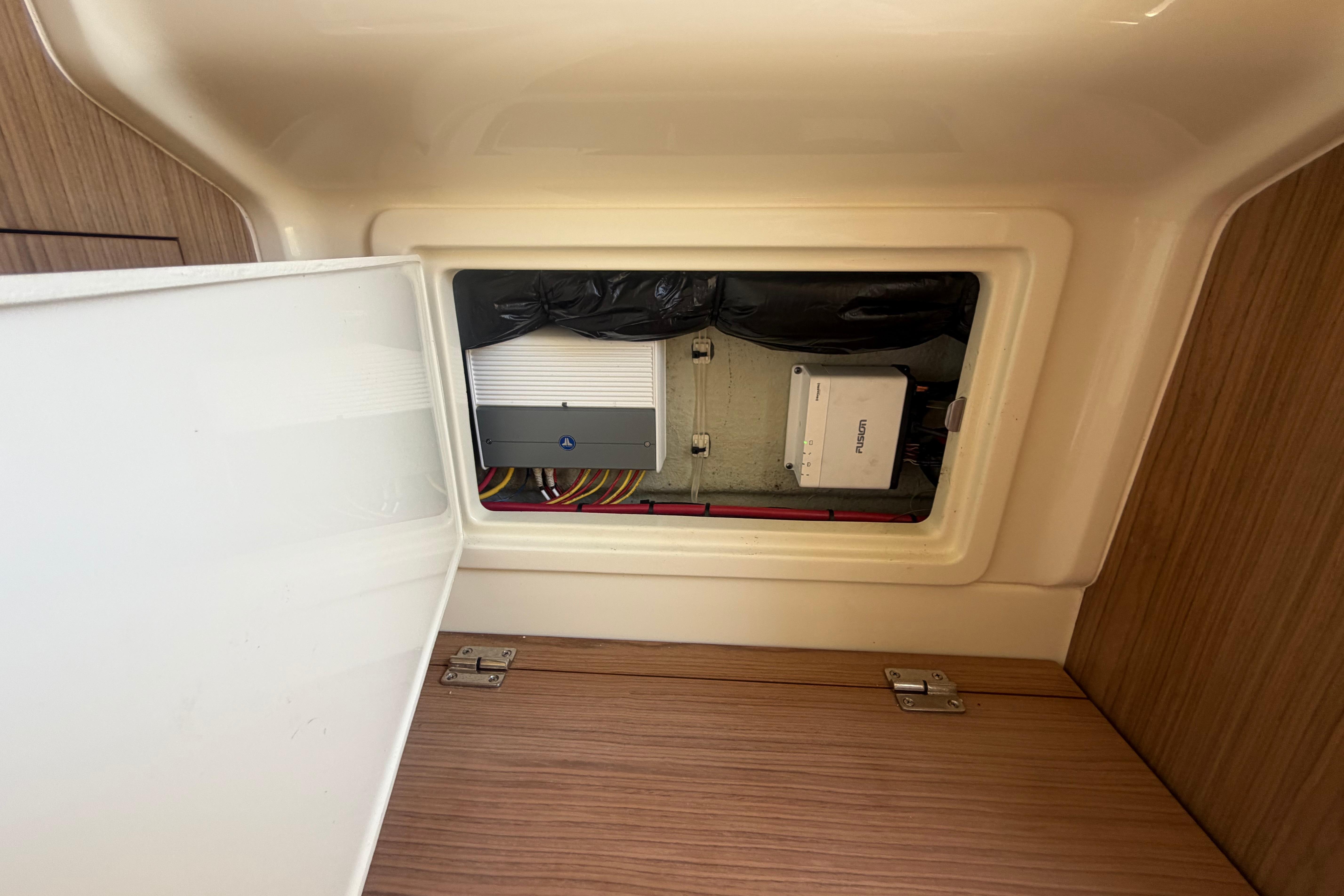 Electrical panel inside 2017 Chris-Craft Catalina 34 boat, showcasing wiring and components.