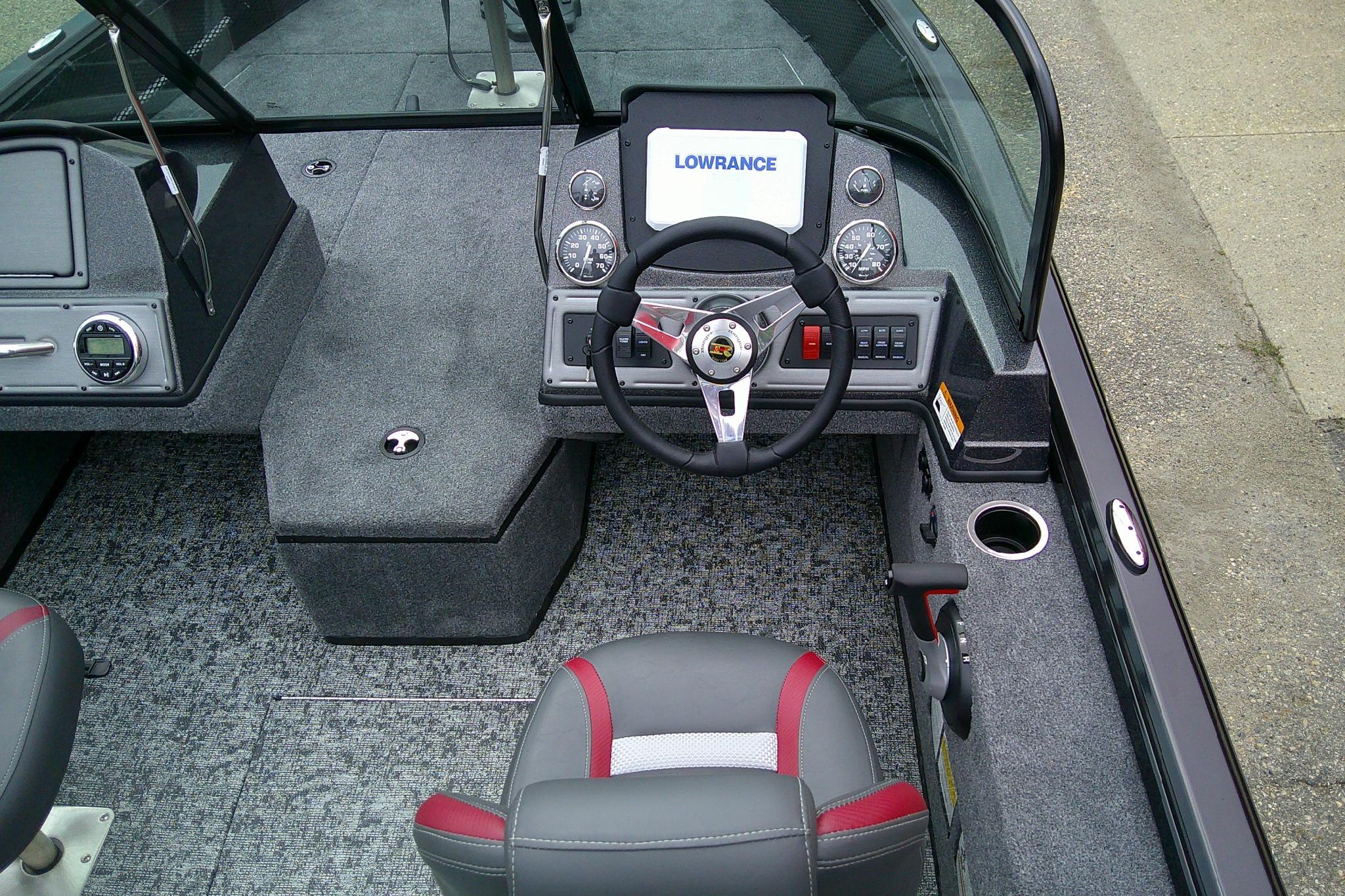 2026 Ranger VS1782SC Reata boat interior with steering wheel and dashboard controls.