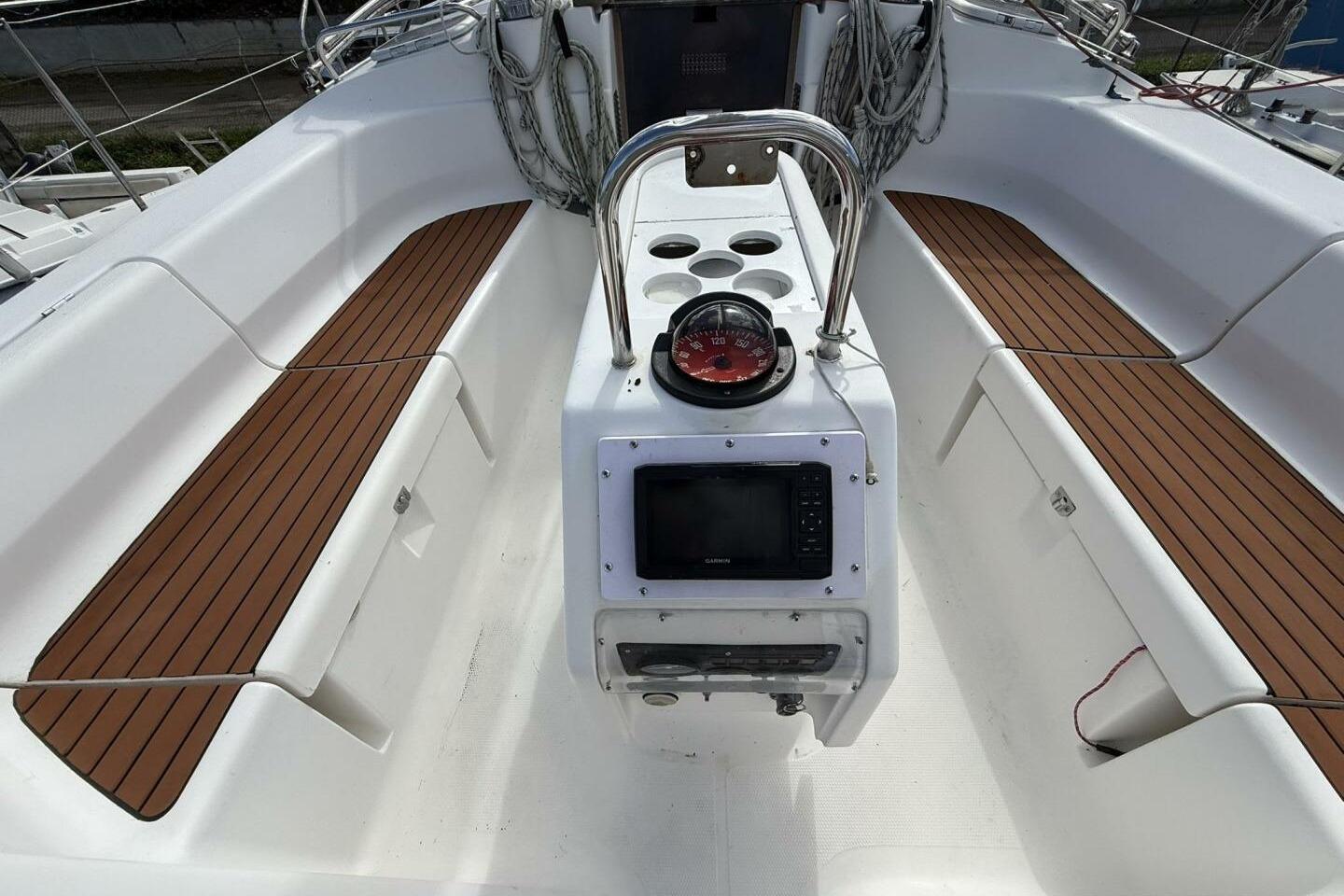 Cockpit of 2002 Dufour Gib’sea 43 sailboat with compass and navigation equipment.