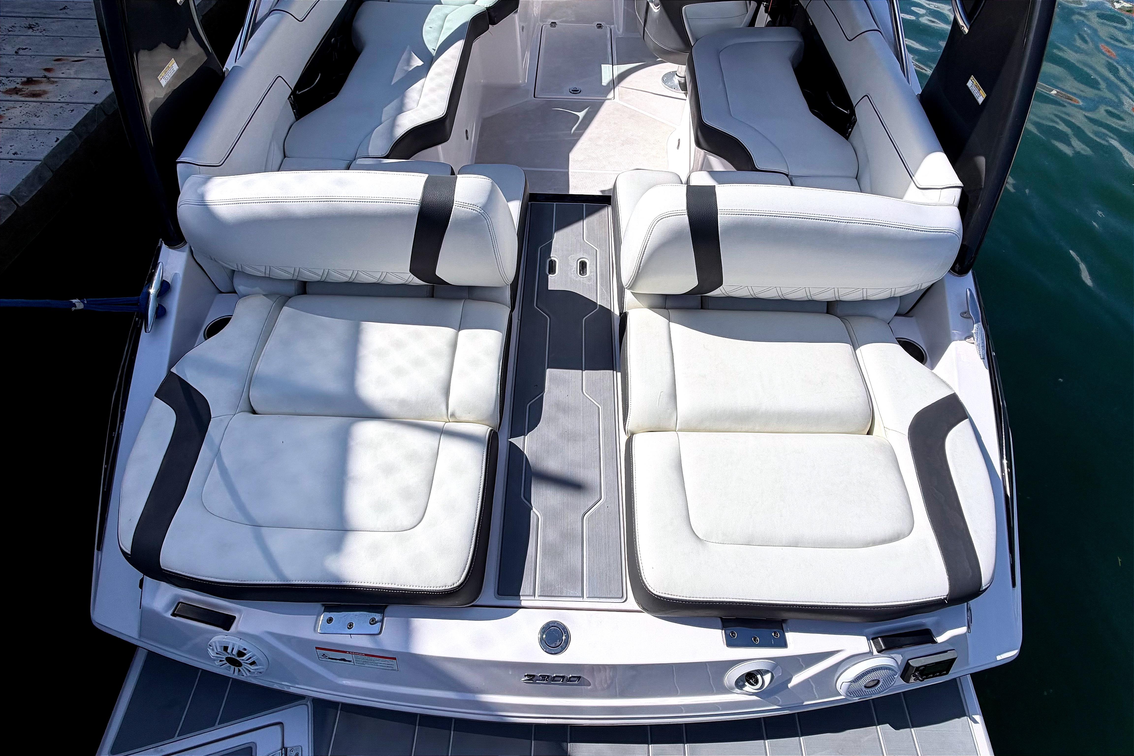 2020 Regal 2300 Bowrider boat with luxurious white seating and sleek design.