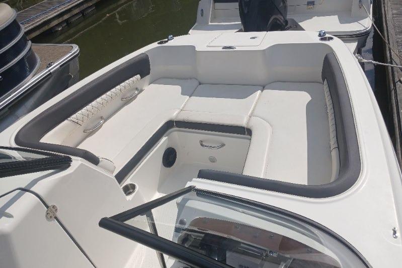 2023 Bayliner DX 2200 boat interior with spacious seating and sleek design.