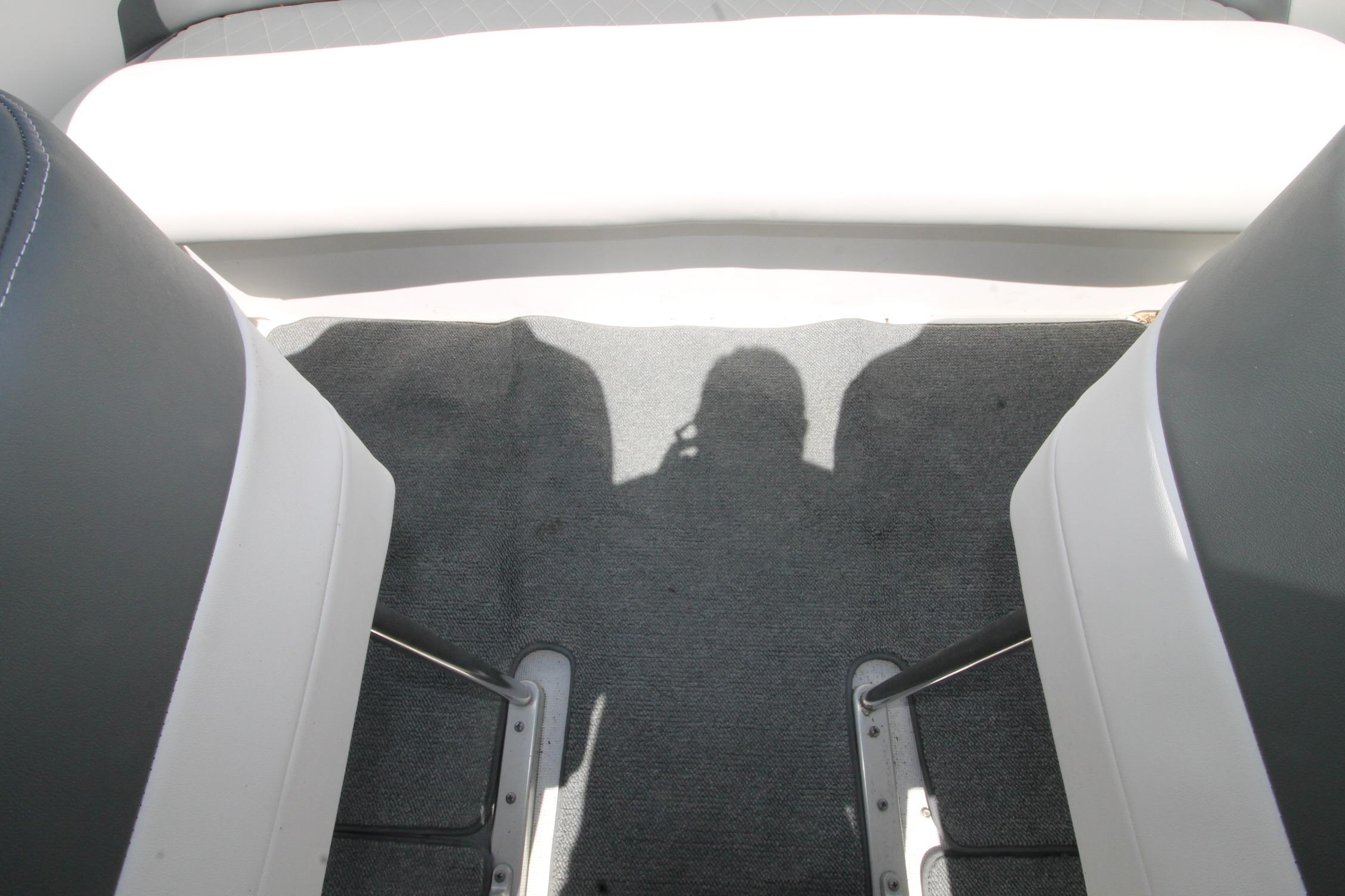 Interior of 2006 Formula 292 FASTech boat showing seating and carpeted floor.