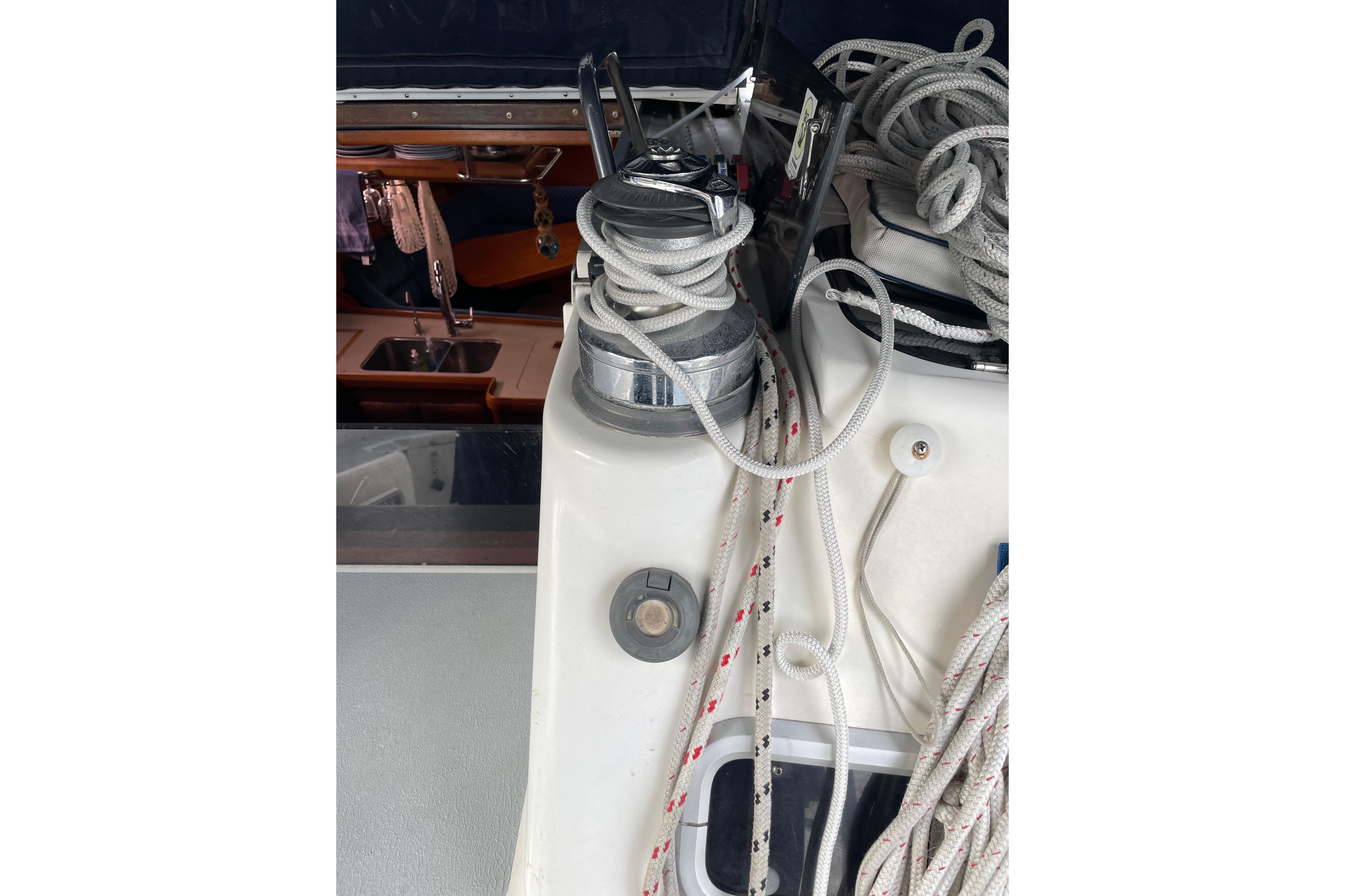 Sailing ropes and winch on 1995 Hunter Legend 40.5 yacht deck.